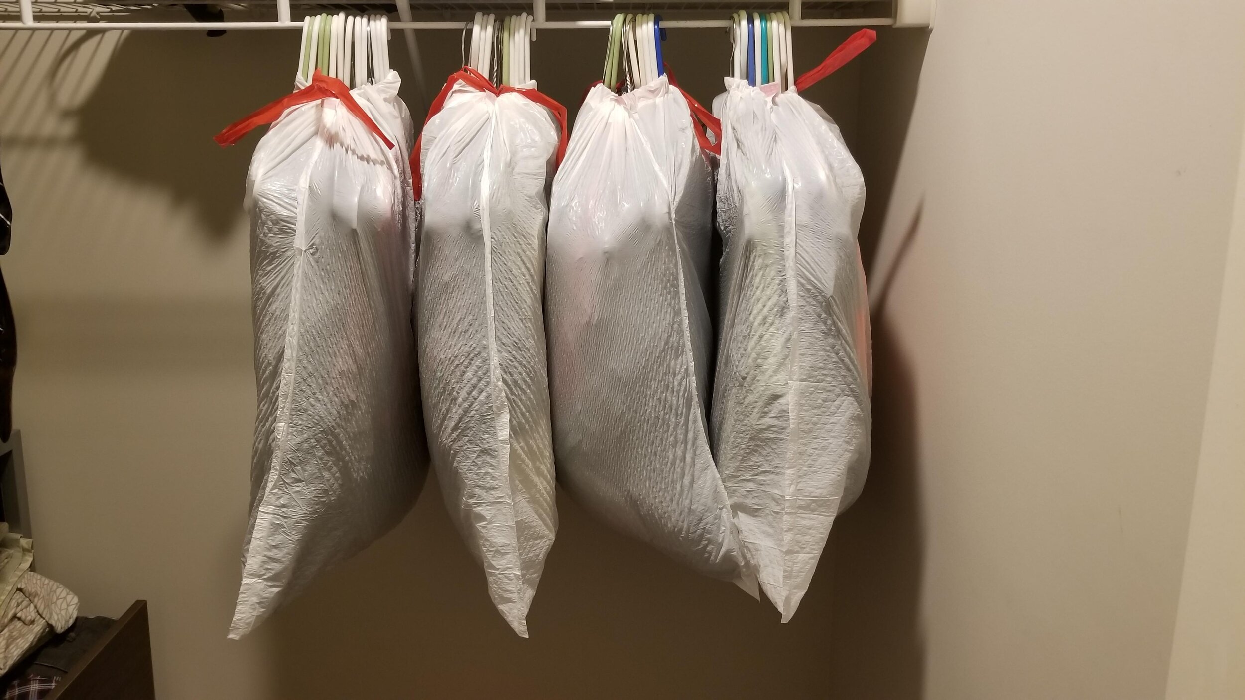 Here's a little trick I use to keep hangers organized while moving