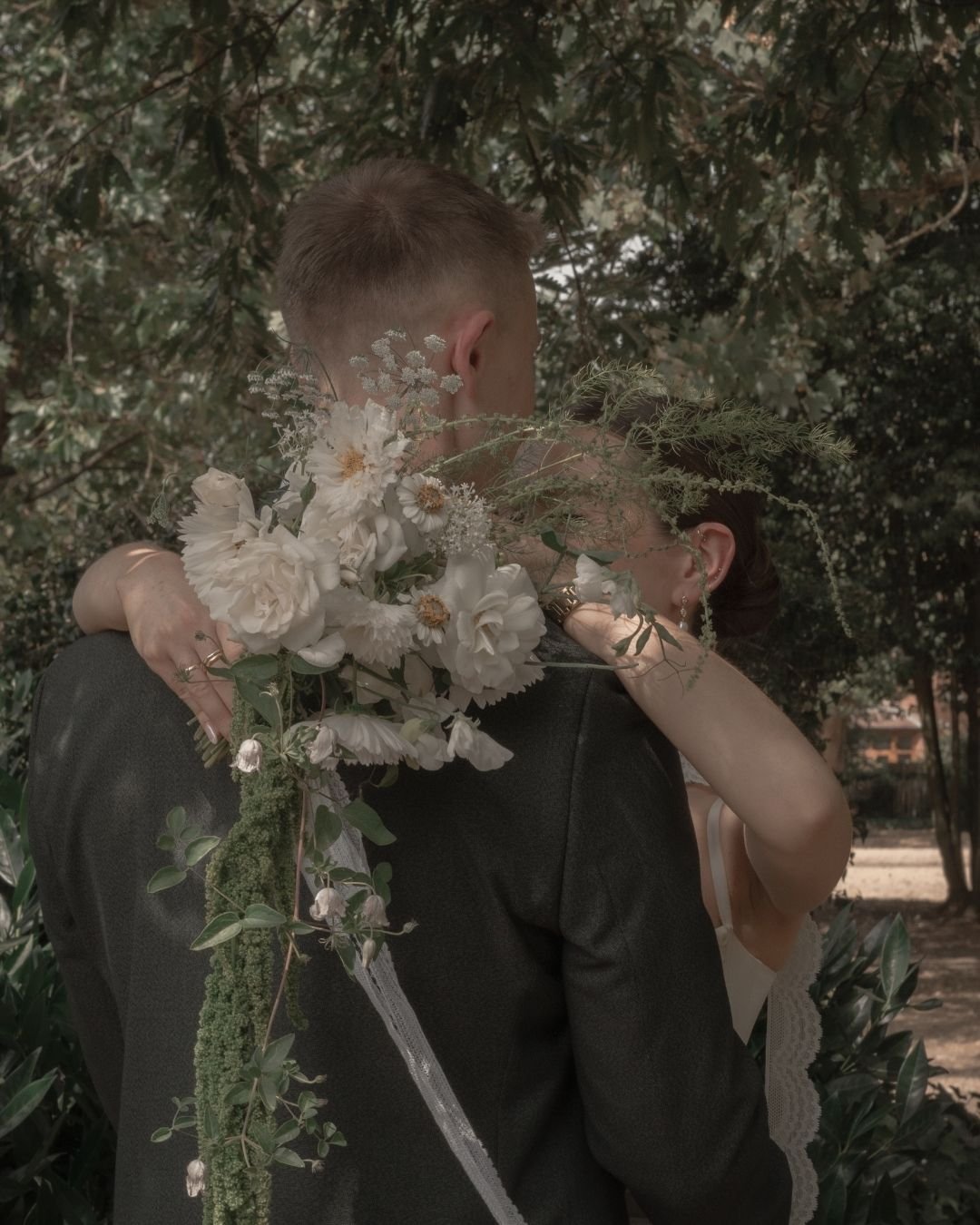 Bride and groom in West Bridgford Park 