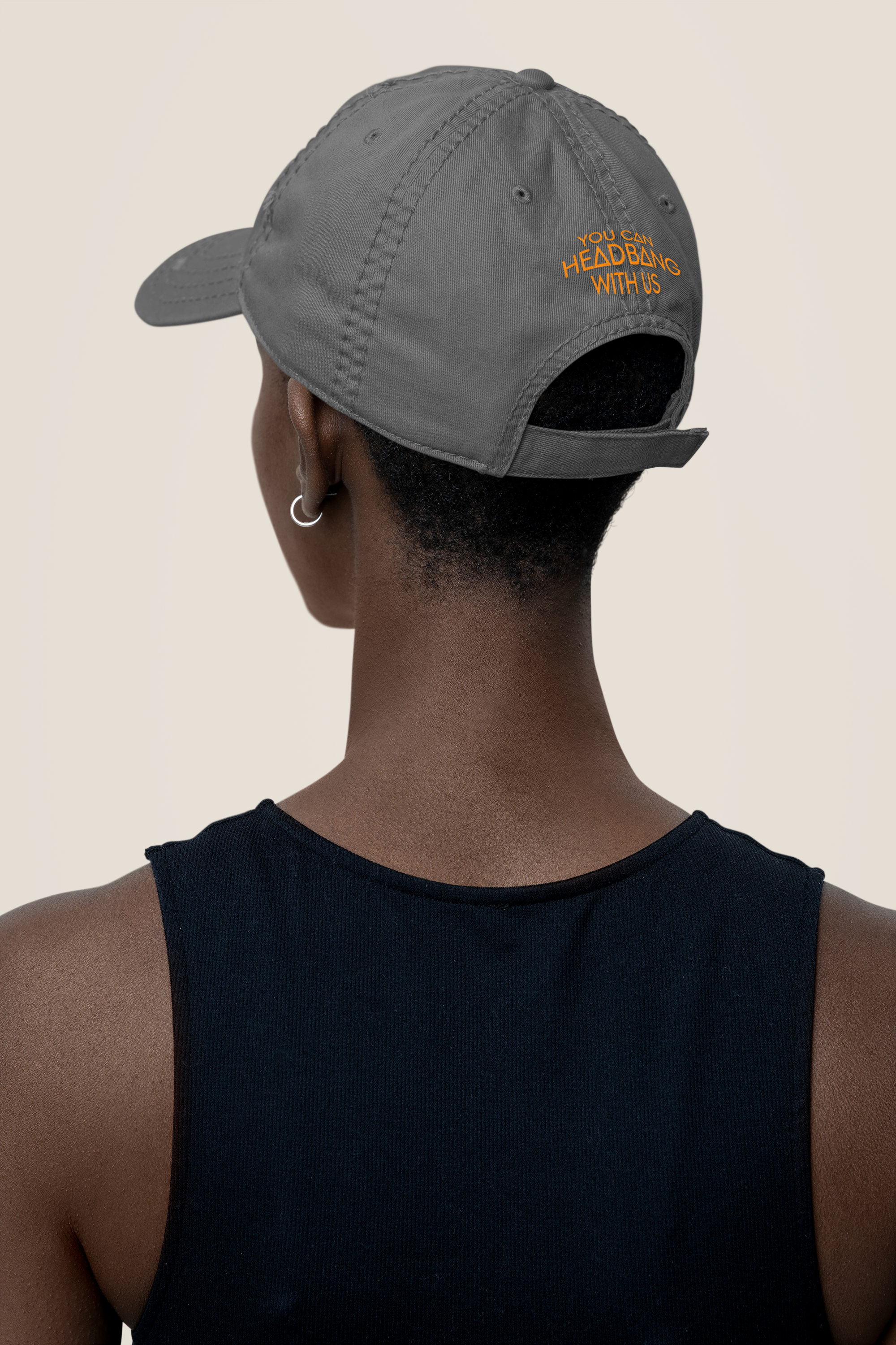 ORANGEback-view-dad-hat-mockup-featuring-a-woman-standing-in-a-studio-m35451.png