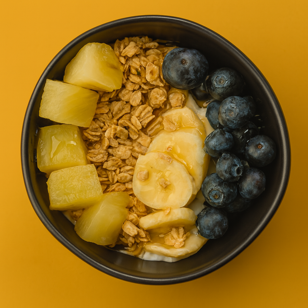 Honey Greek Yogurt, Granola, Blueberries, Banana, Pineapple, & Honey Drizzle.
