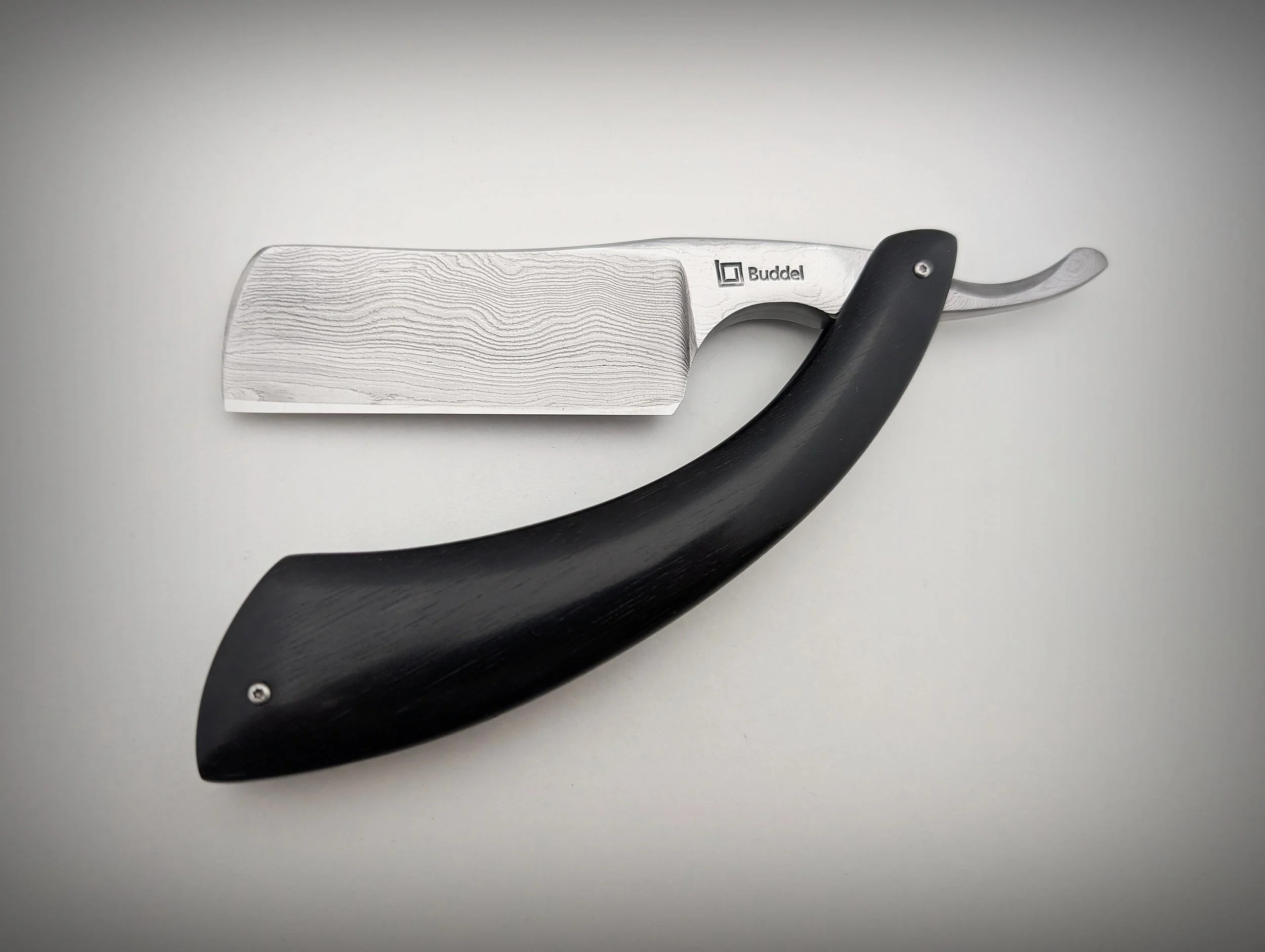 8/8 Buddel Rasiermesser aus Damast und Ebenholz