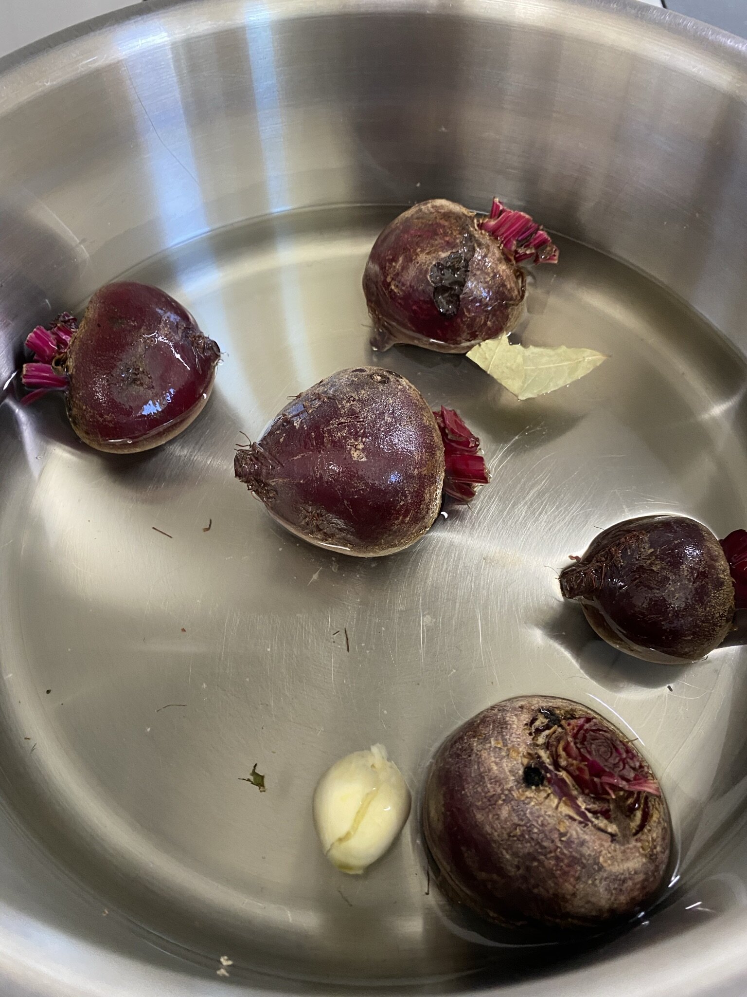 Beets in their poaching liquid