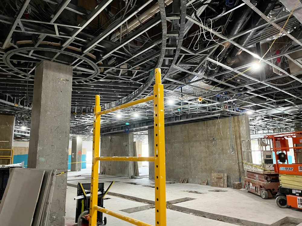 Workers are quickly readying this space to be accessible to guests, conference attendees, and locals. Photo credit The Vine