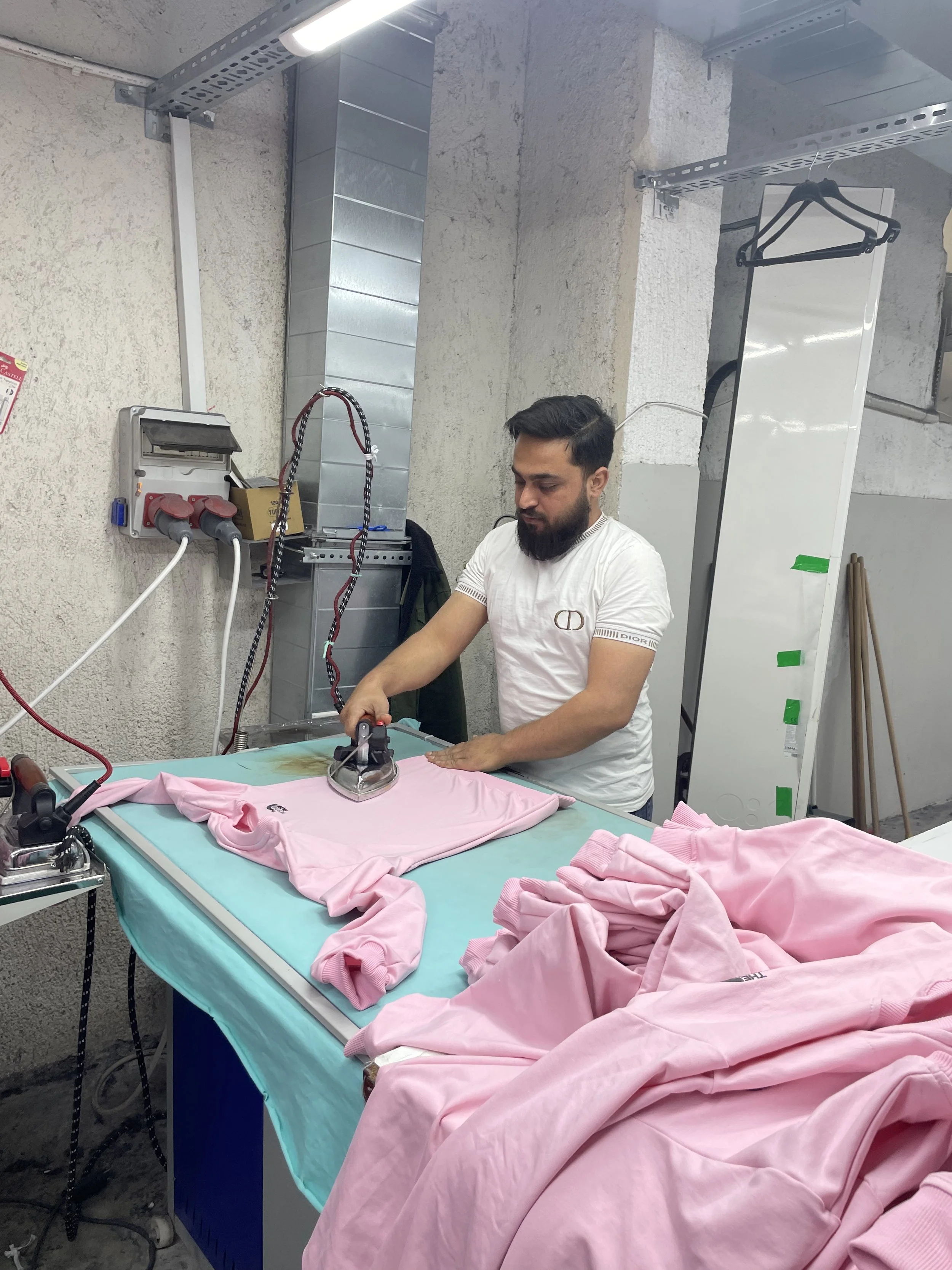clothing manufacturing - at the ironing stage of clothing production