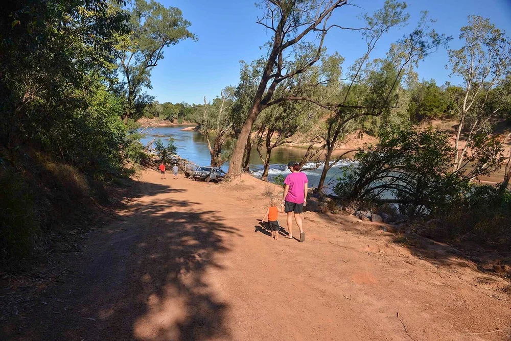 Road approaching the crossing, in good condition
