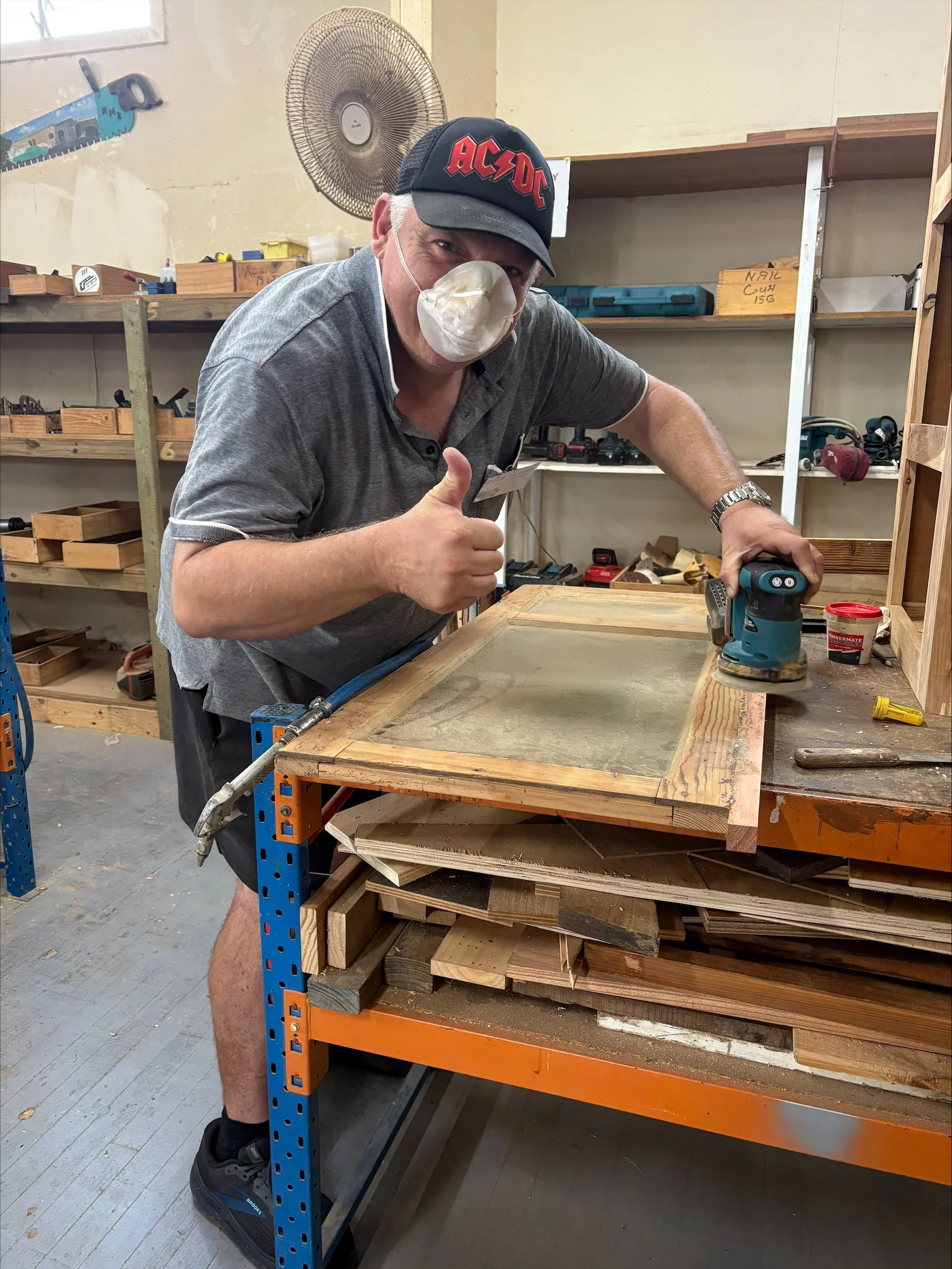 Luke working on his cabinet at Men's Shed.jpeg