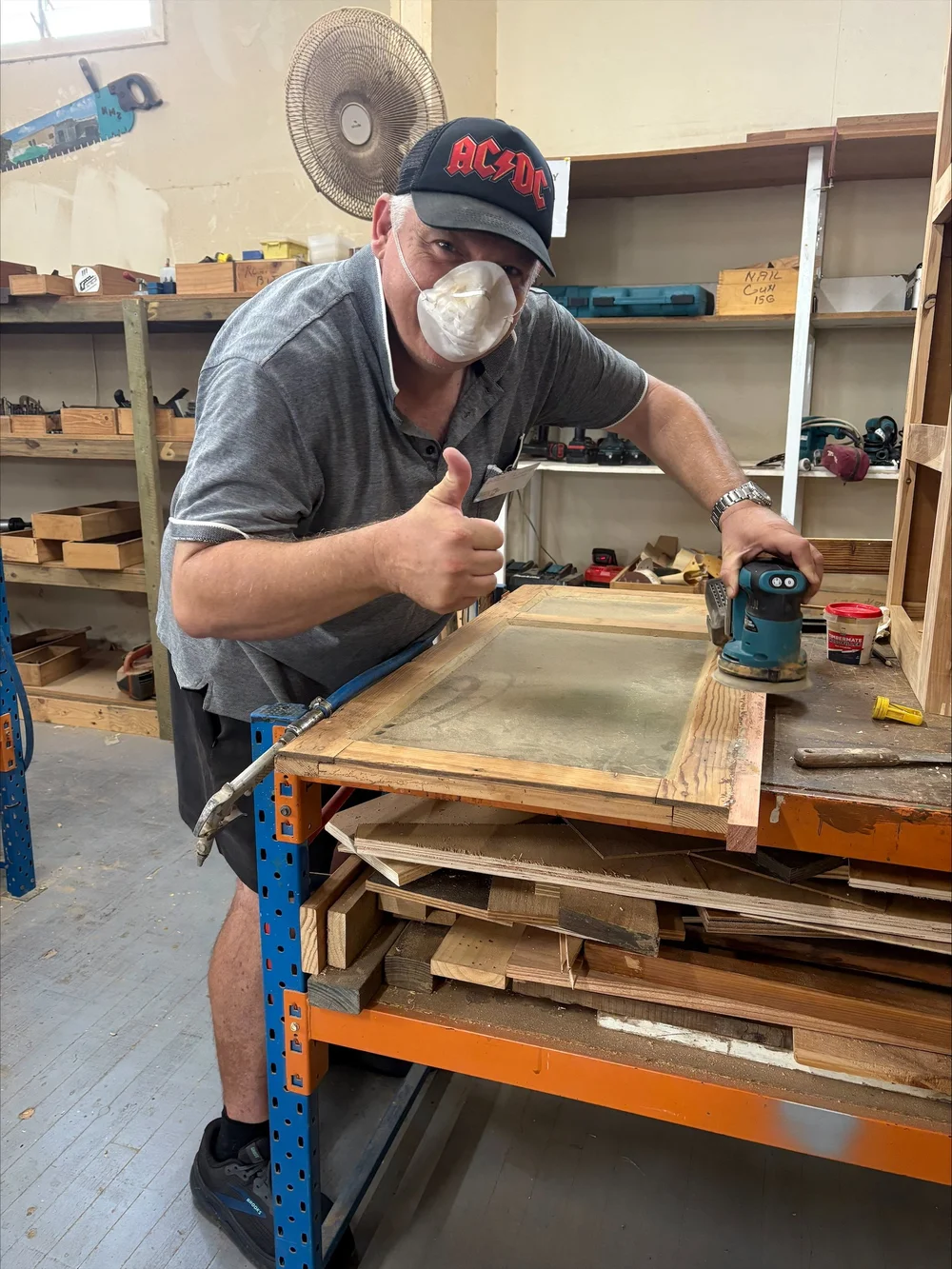 Luke working on his cabinet at Men's Shed.jpeg