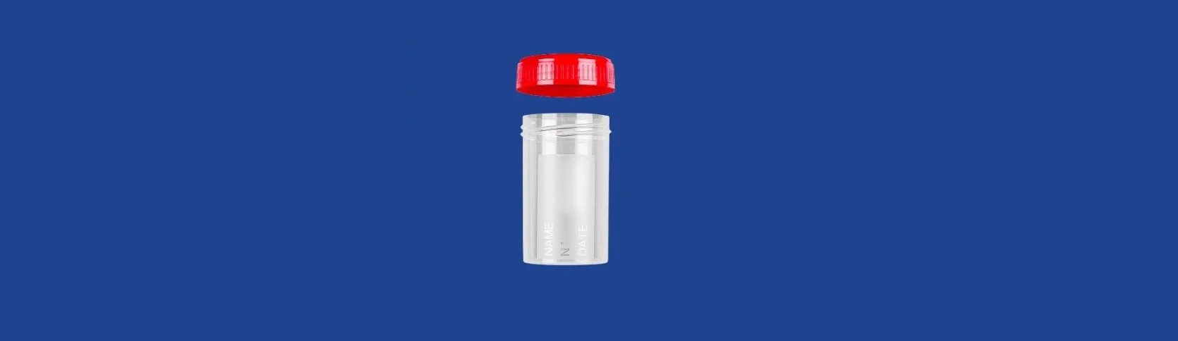 Plastic container with a red lid on a blue background.
