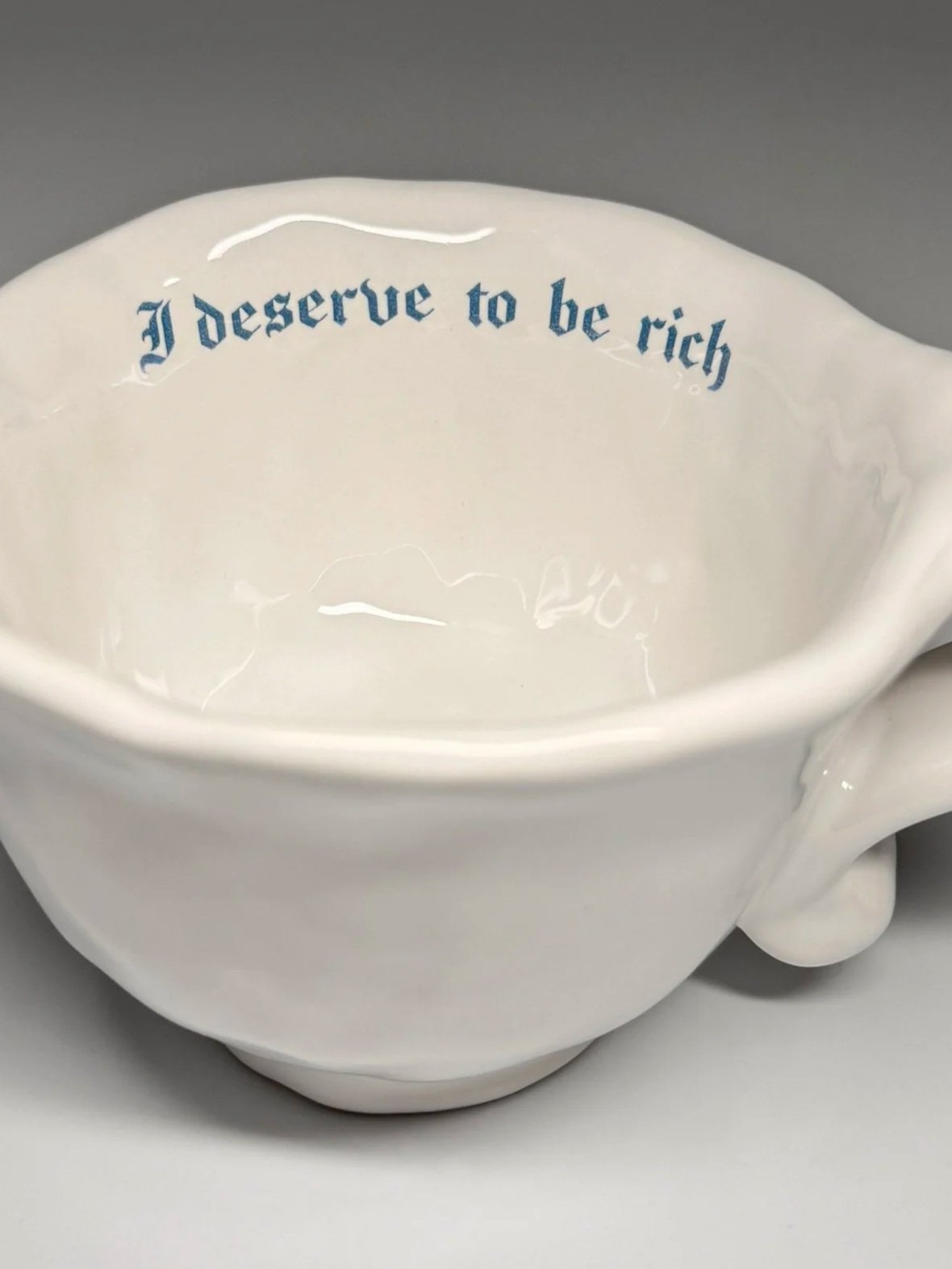 Issues Cappuccino Cup - "I deserve to be rich"