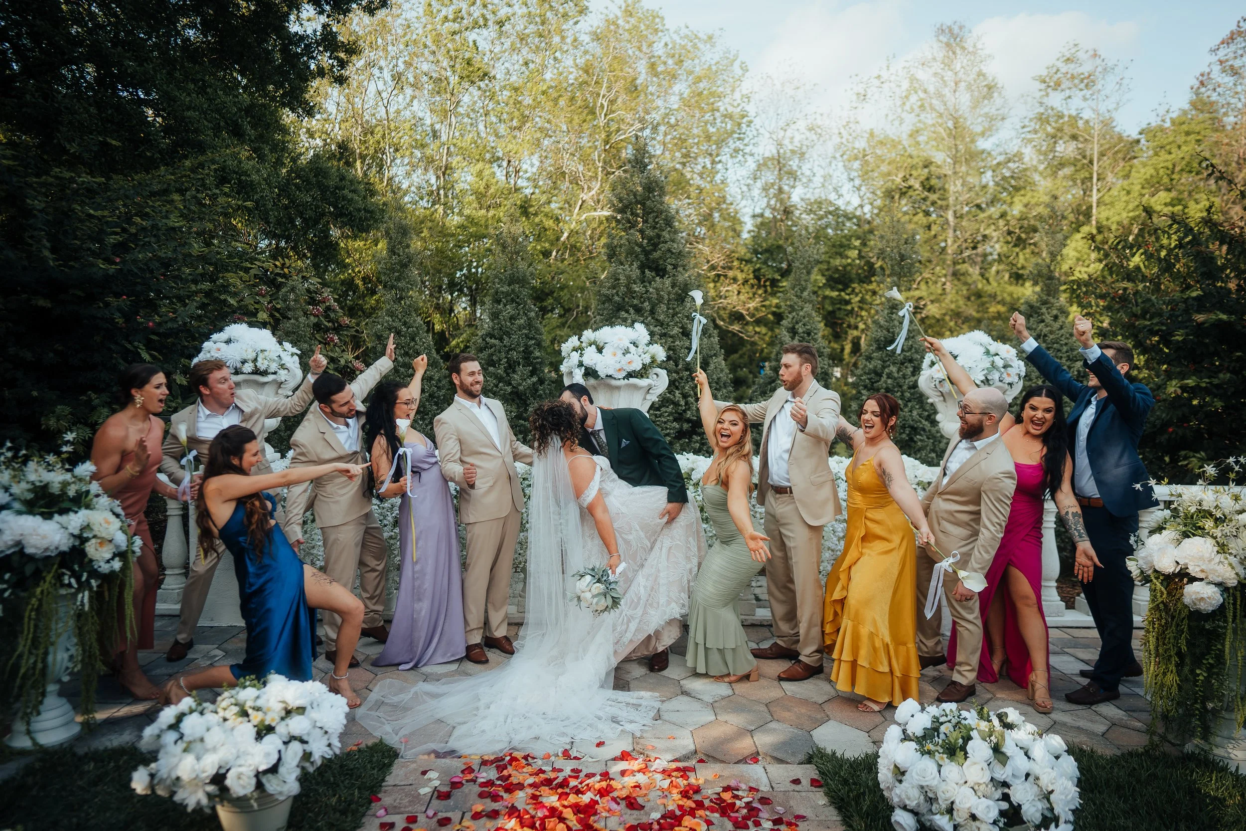 A bride and groom share a loving moment outdoors at sunset, surrounded by trees and string lights, with mountains in the background at Appalachian View wedding venue in North Caroline