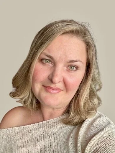 Portrait of Dr. Jenny Horch, smiling with a neutral background
