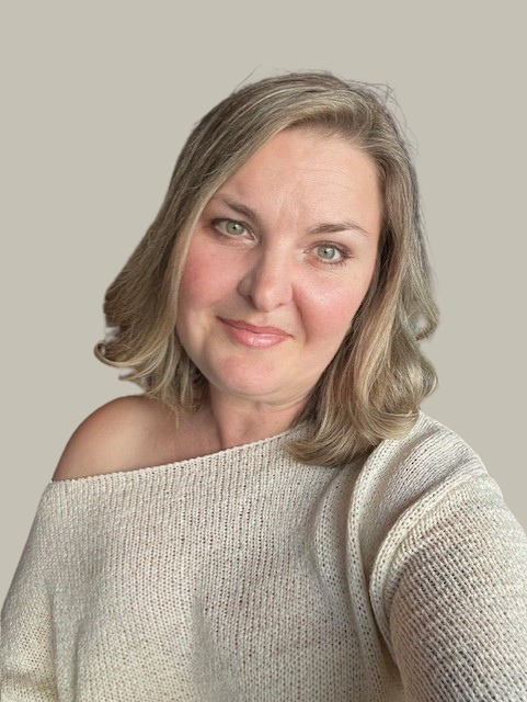 Portrait of Dr. Jenny Horch, smiling with neutral background