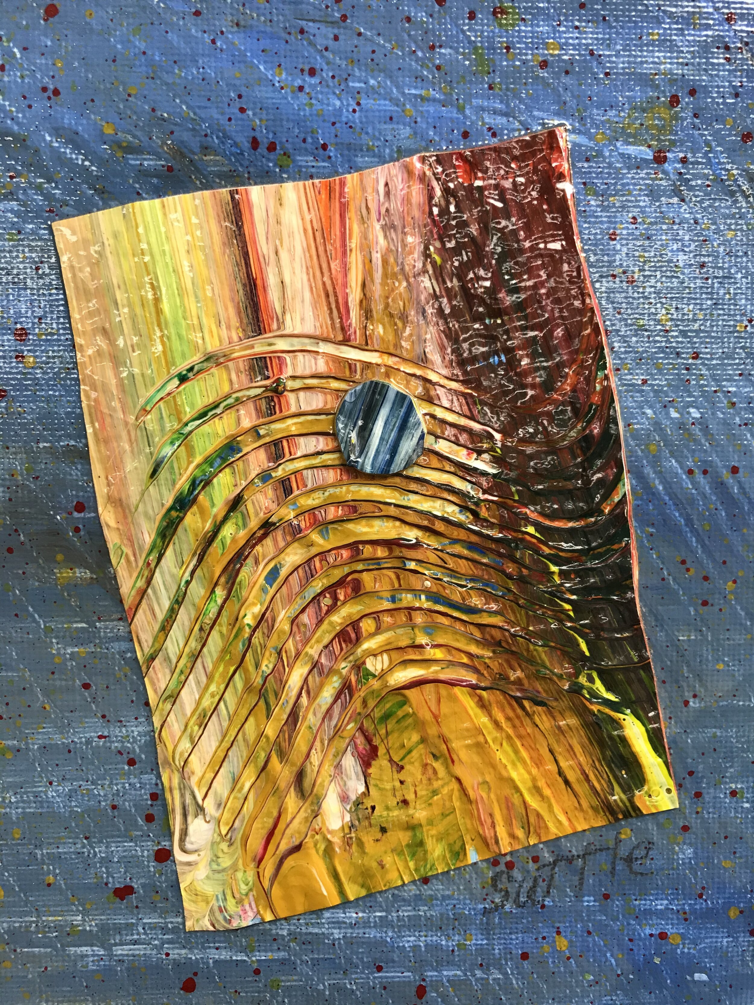 This is a collage made of acrylic paint skins on a 5x7 canvas board. It is nonrepresentational and contemporary in style.