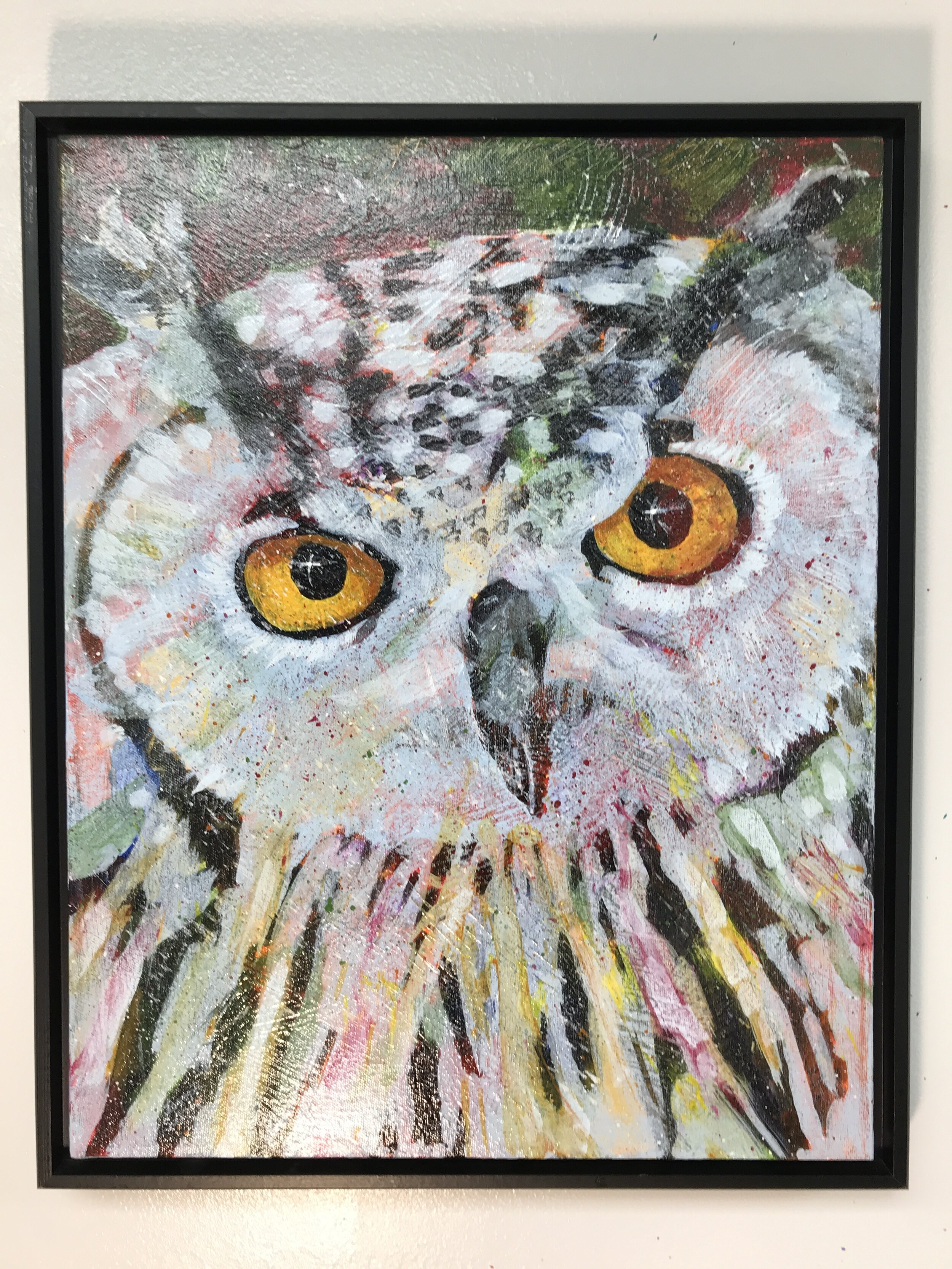 This original painting by Joseph Suttle shows the face of an owl and a reflection of a cross is found in the highlights in each eye.
