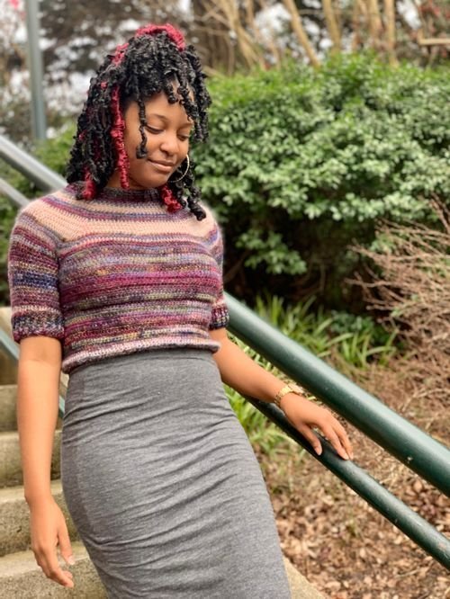 Patrice Weldon of Fab Plain Jane Creates in a striped short-sleeve knit top and gray skirt