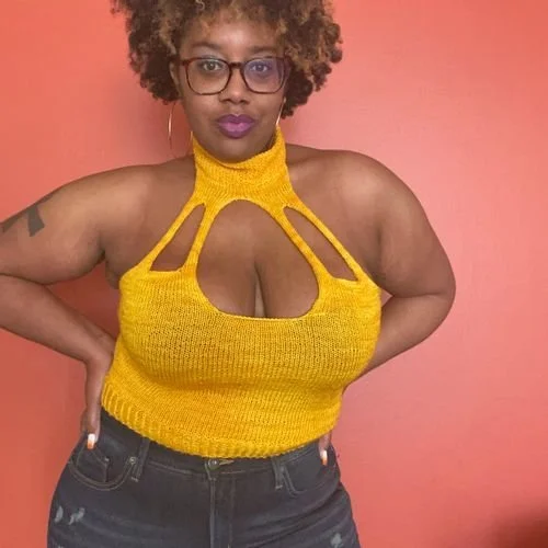 Katrice Bonner in a yellow knit halter top with a cutout neckline