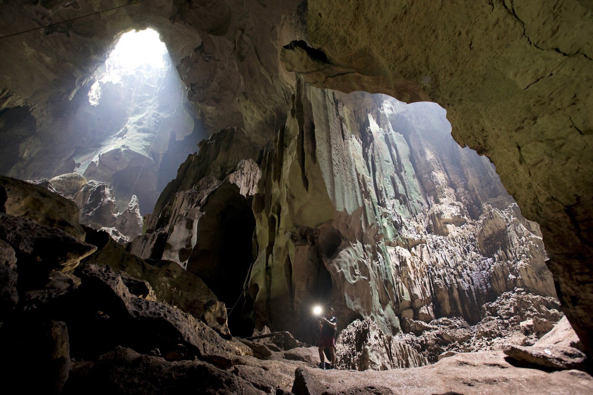 cameraman-filming-in-caves-borneo_37448739870_o-1920w.jpg