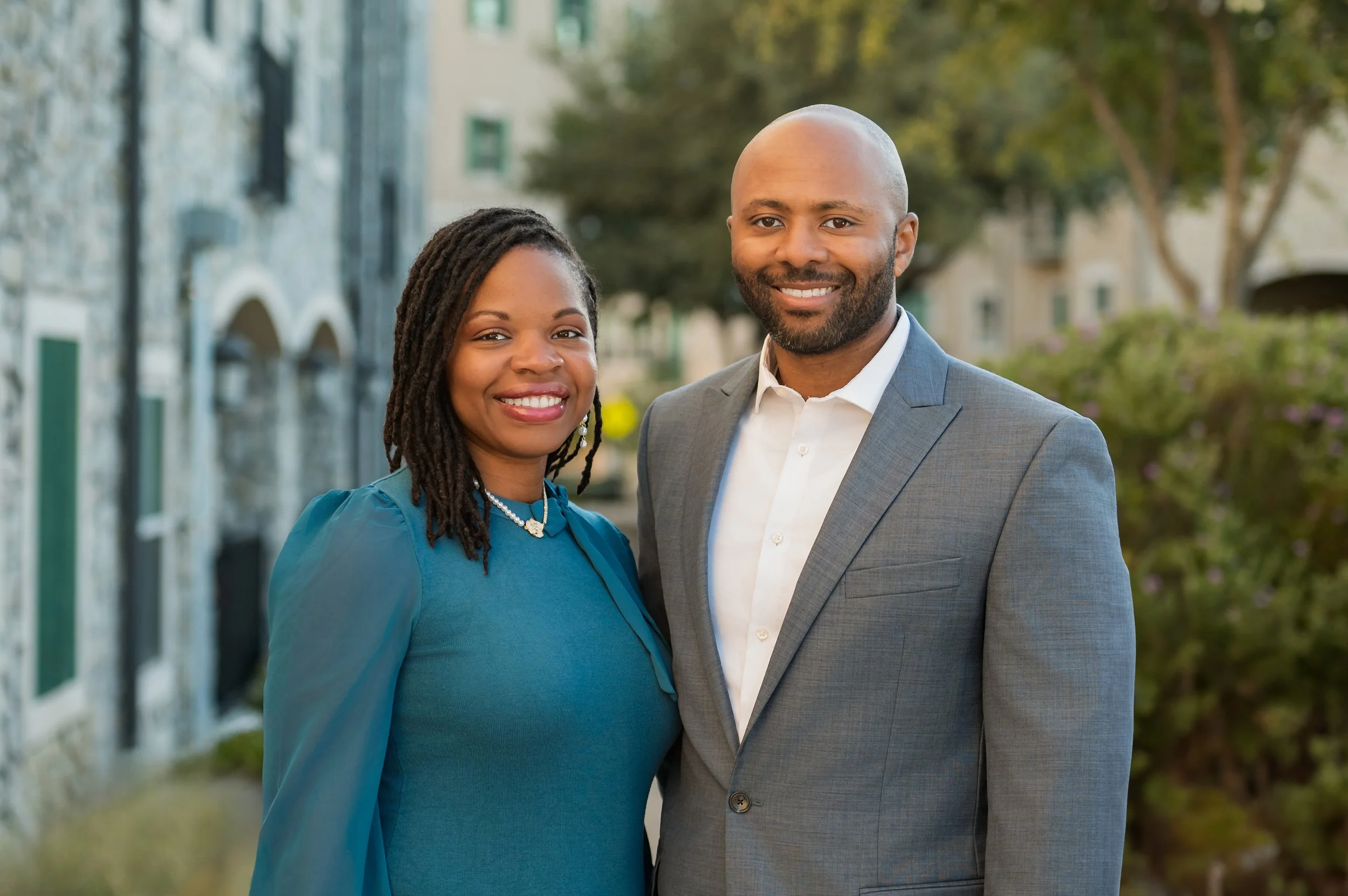 Co-therapy team behind Soul Journey Therapy & Coaching Services pictured together in a professional headshot