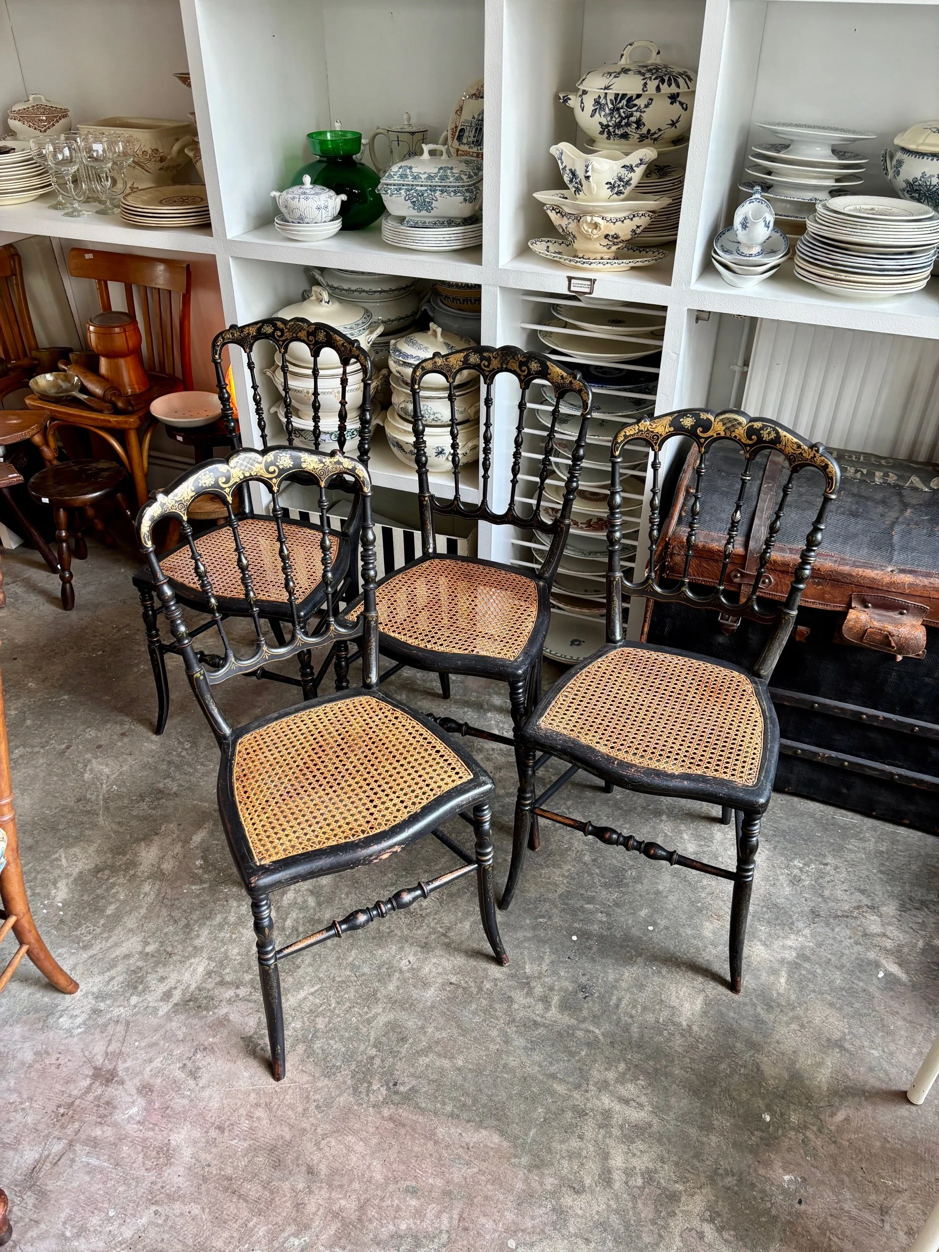 Chaise Napoléon III en bois noir et doré et cannage
