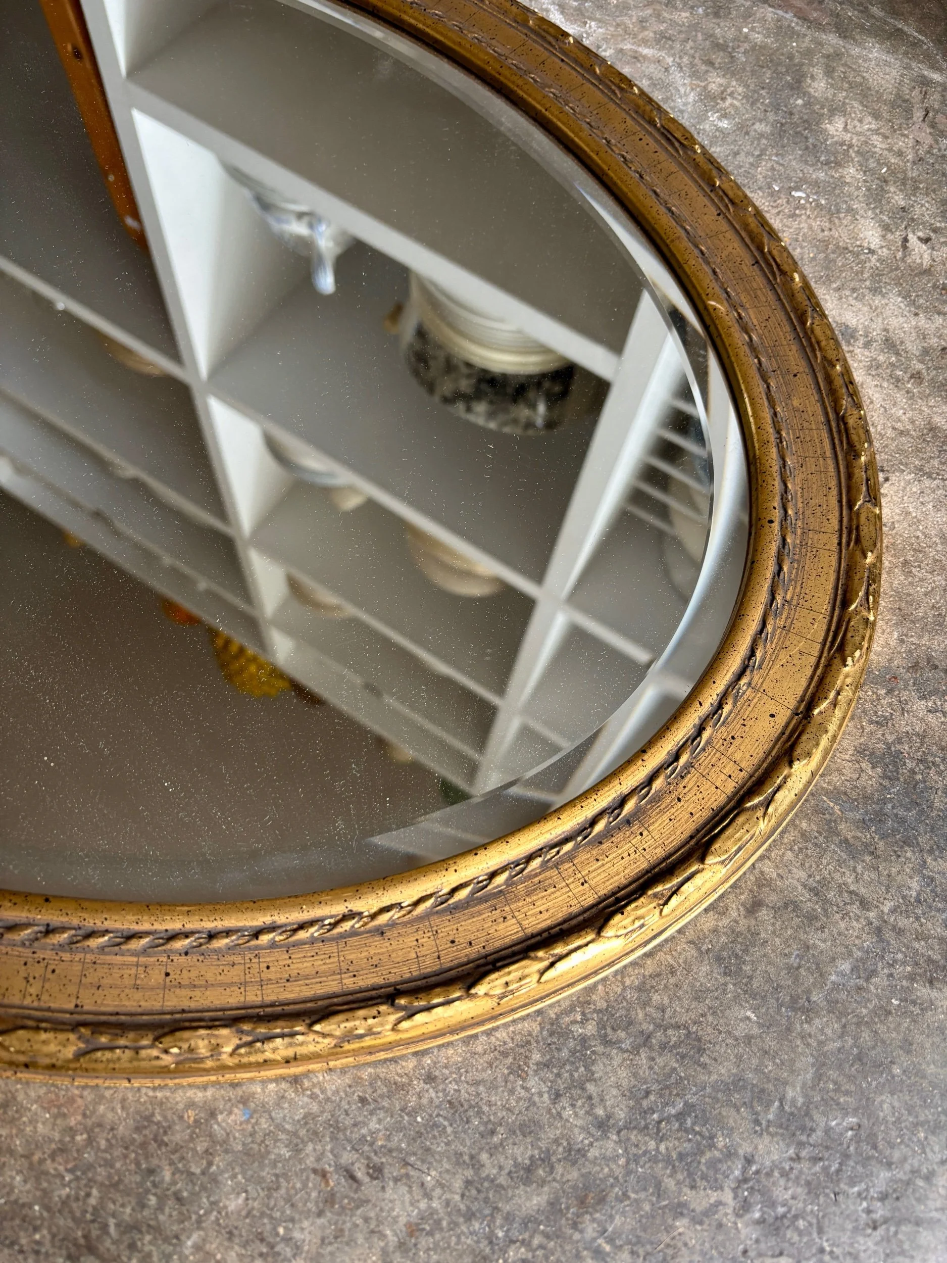 miroir-ovale-dore-noeud-deknudt-belgique-decoration-vintage-axs-design-paris-france