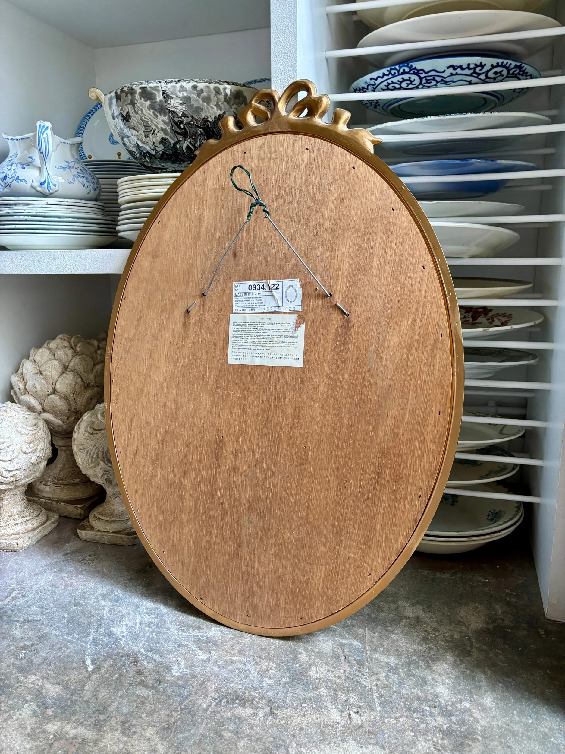 miroir-ovale-dore-noeud-deknudt-belgique-decoration-vintage-axs-design-paris-france