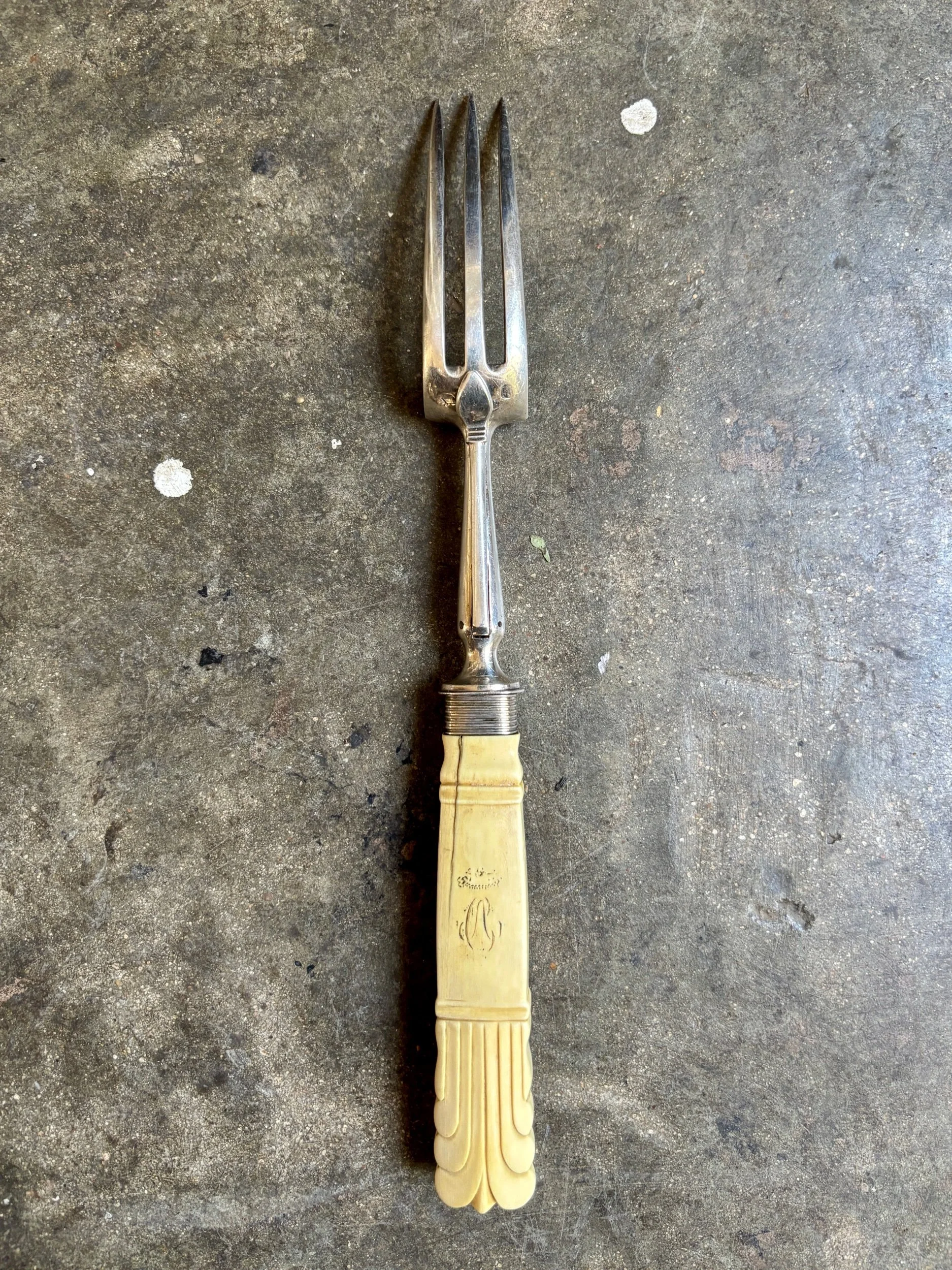 Fourchette de service en argent et os