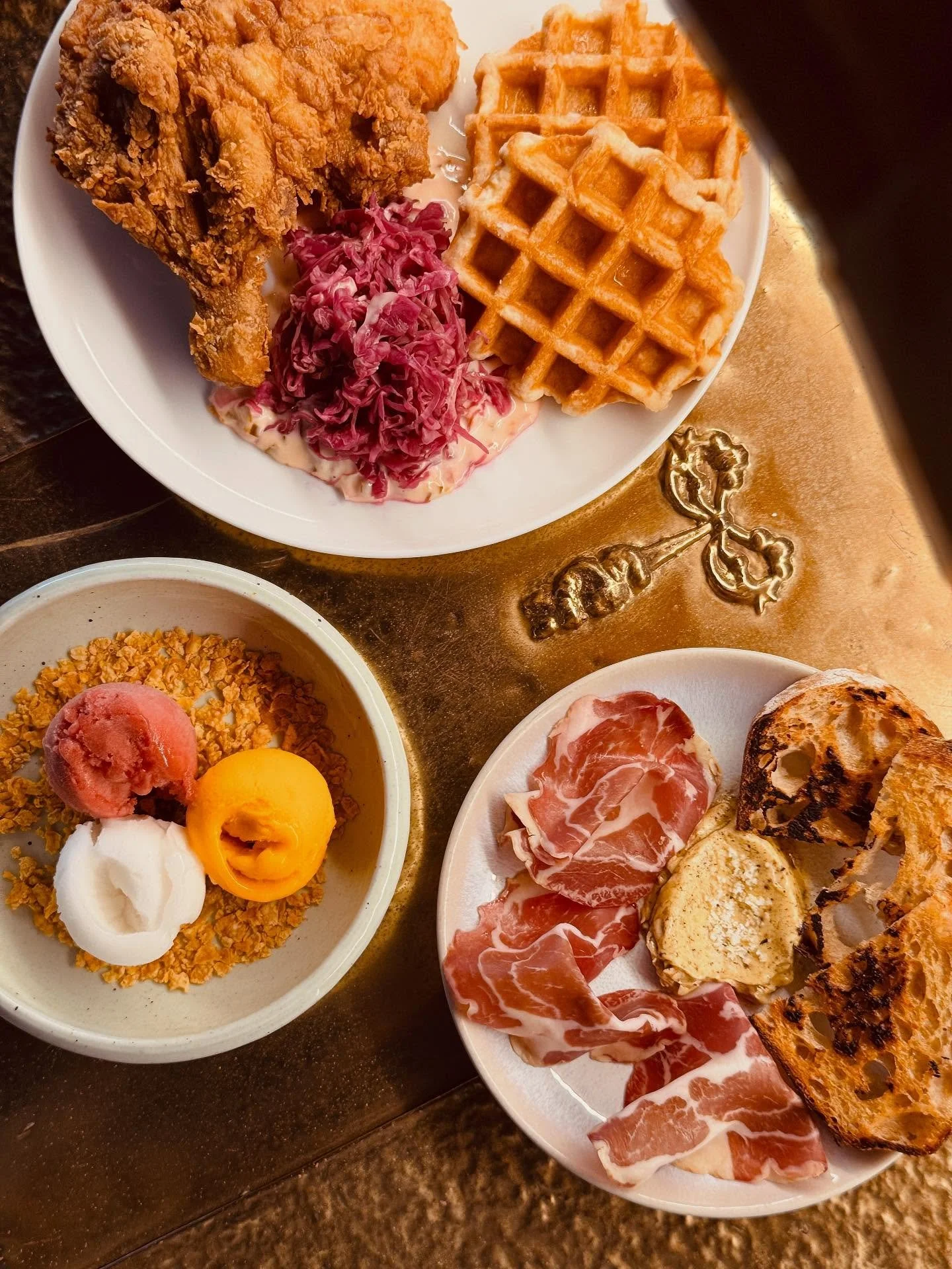 These three dishes bring the good life to your summer.
No matter where you are in your journey, you deserve this perfect combo Crispy Chicken &amp; Waffle, Coppa &amp; Sourdough, and the Sorbet Trio. They&rsquo;re made to brighten your day and a glas