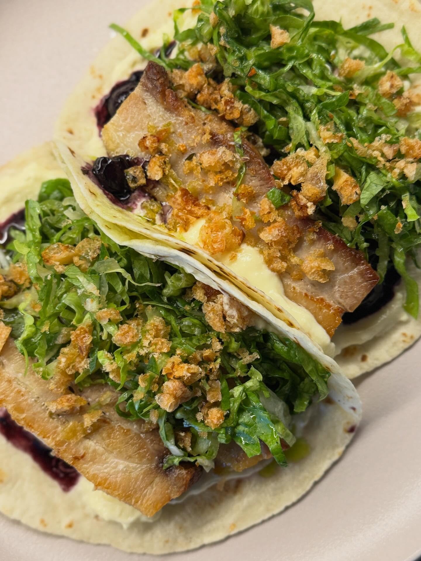 PORK BELLY TACO
Tender pork belly paired with a vibrant blueberry sauce, finished with sour cream, crisp lettuce, and wrapped in a warm tortilla.

A simple yet deeply satisfying bite.

#beachcluborakei #orakei #nzcusine #taco #nztaco