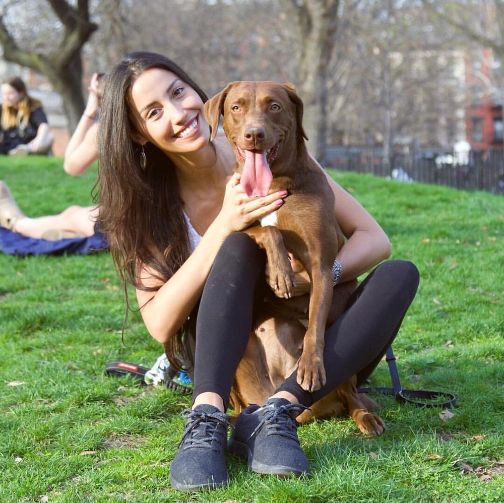 Ana Mann, founder of Jazz's Wonderland, with her dog