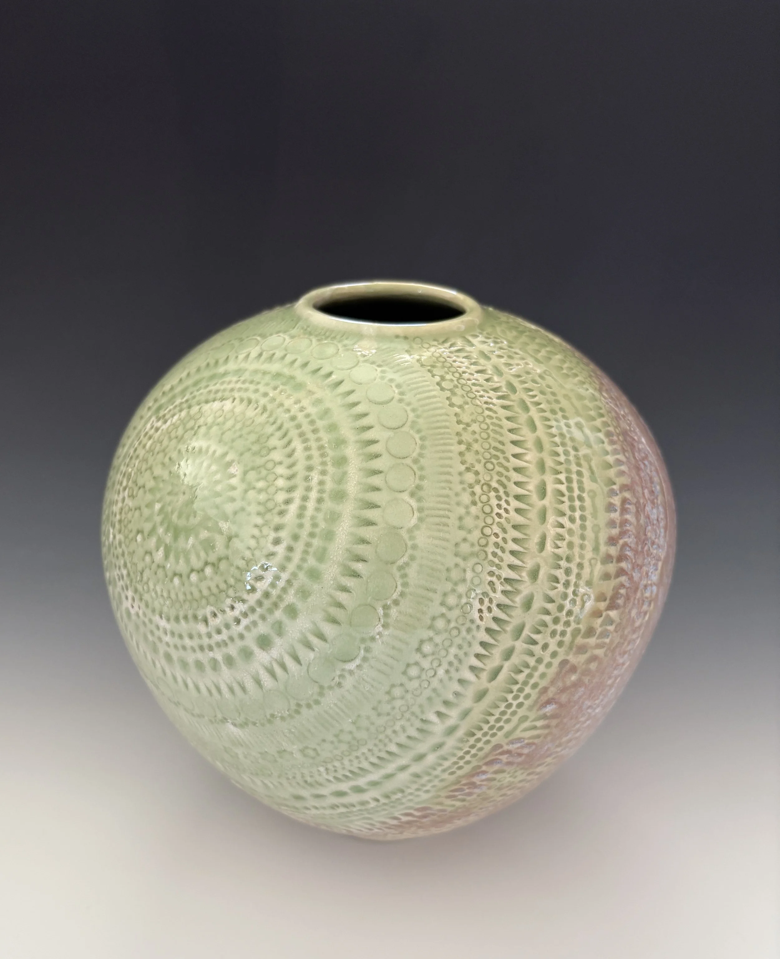Vessel with carving; 7" tall; $225