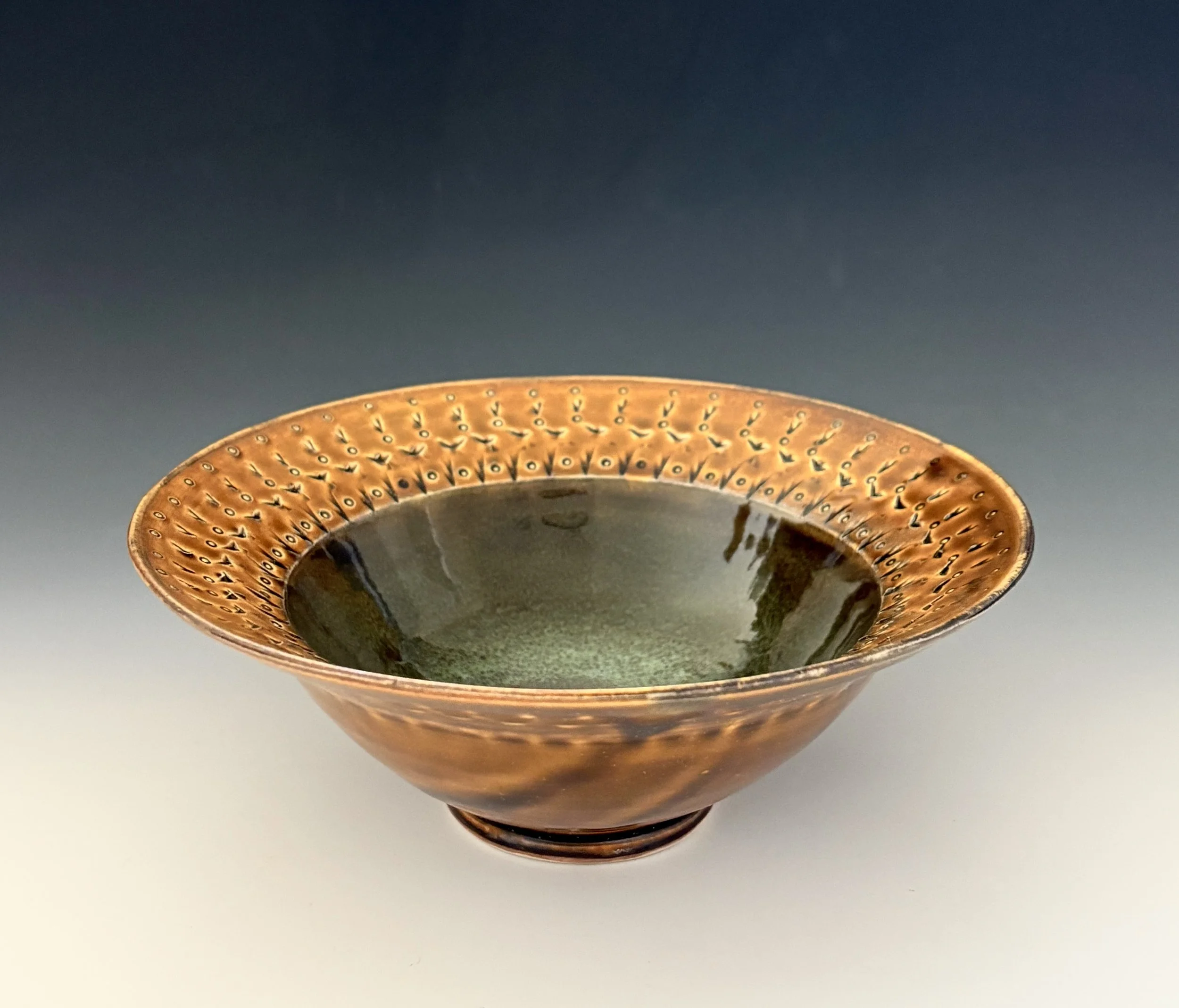 Medium amber flared rim bowl; 9" diameter; $70