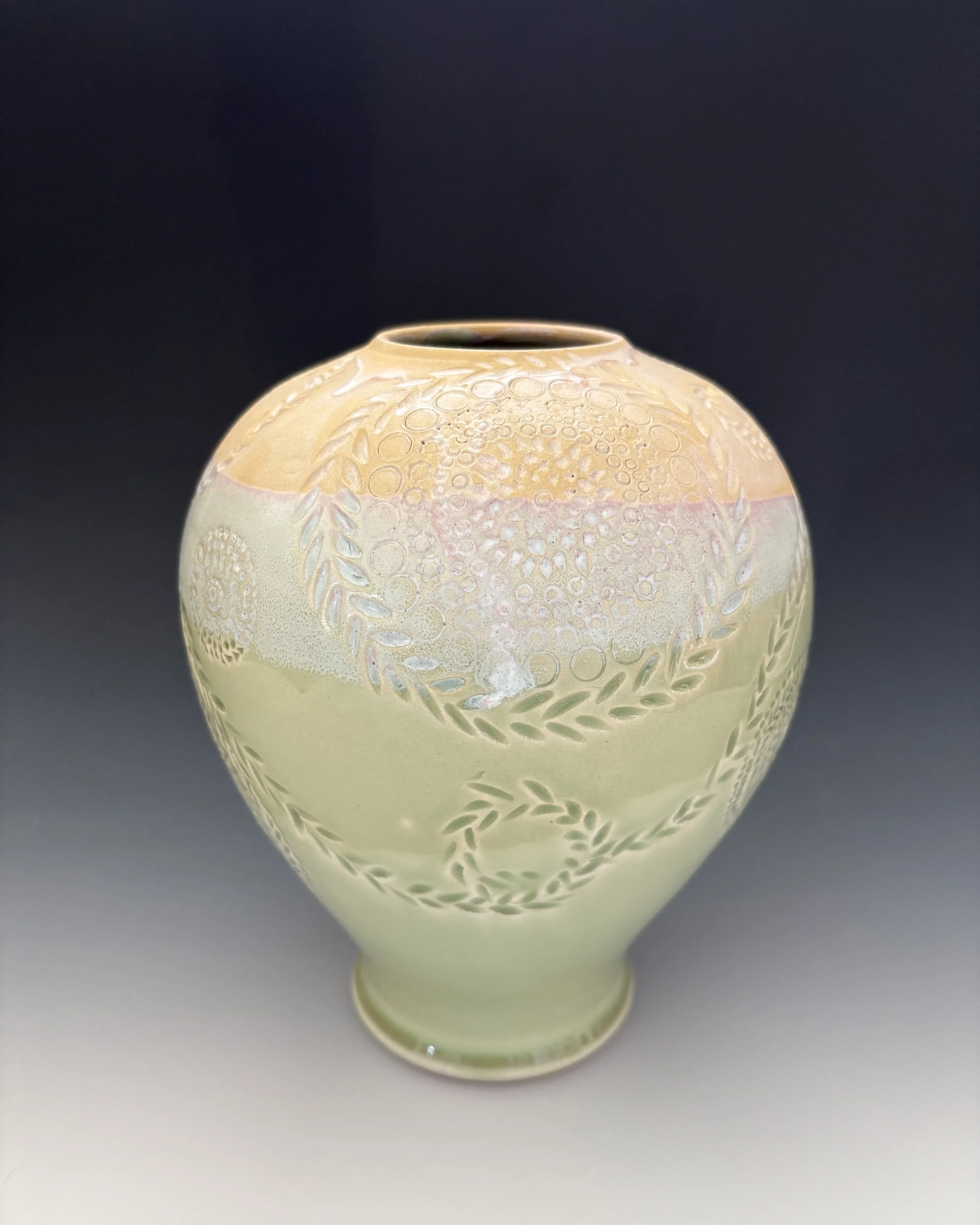 Vessel with carvings; 8" tall; $225