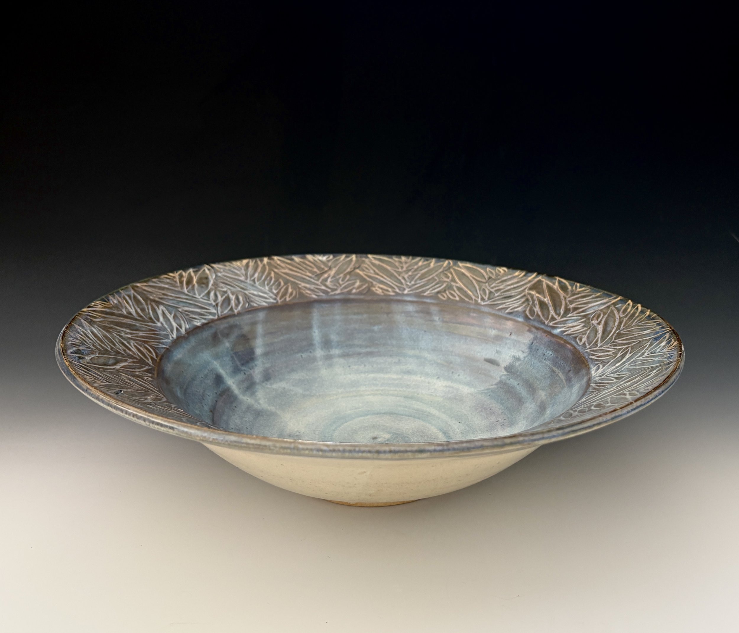 Carved serving bowl; 13" diameter; $150