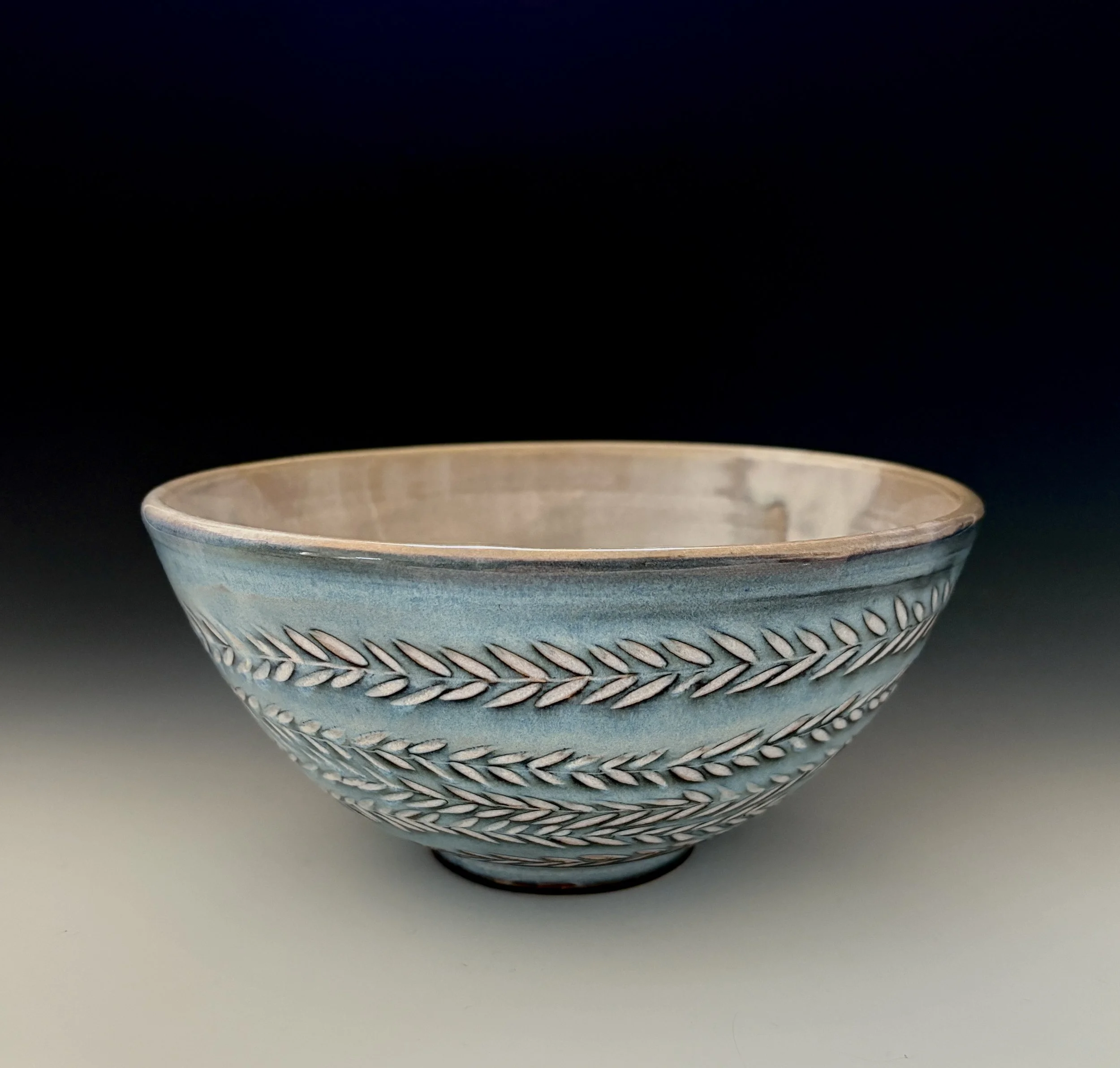 Medium carved serving bowl; 9" diameter; $90