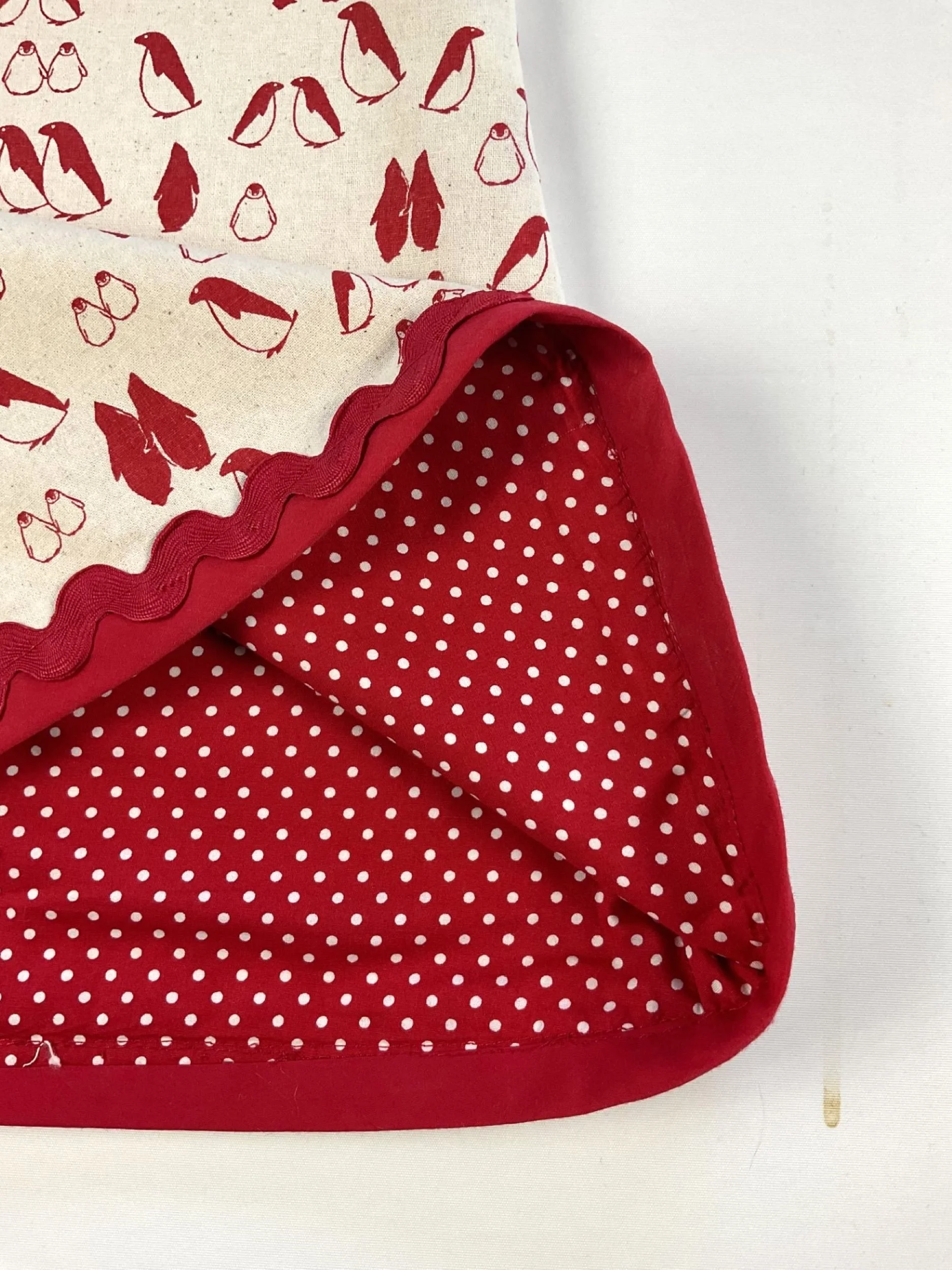 kissing penguins red dress lining rw.jpg