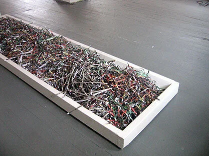 It's Safe To Open Your Eyes Now, Pt 1: Mixed Media Installation with Shredded Photos from US Army internal investigation of Abu Ghraib. [Visible Collective/Mohaiemen]