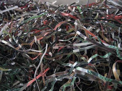 It's Safe To Open Your Eyes Now, Pt 1: Mixed Media Installation with Shredded Photos from US Army internal investigation of Abu Ghraib. [Visible Collective/Mohaiemen]