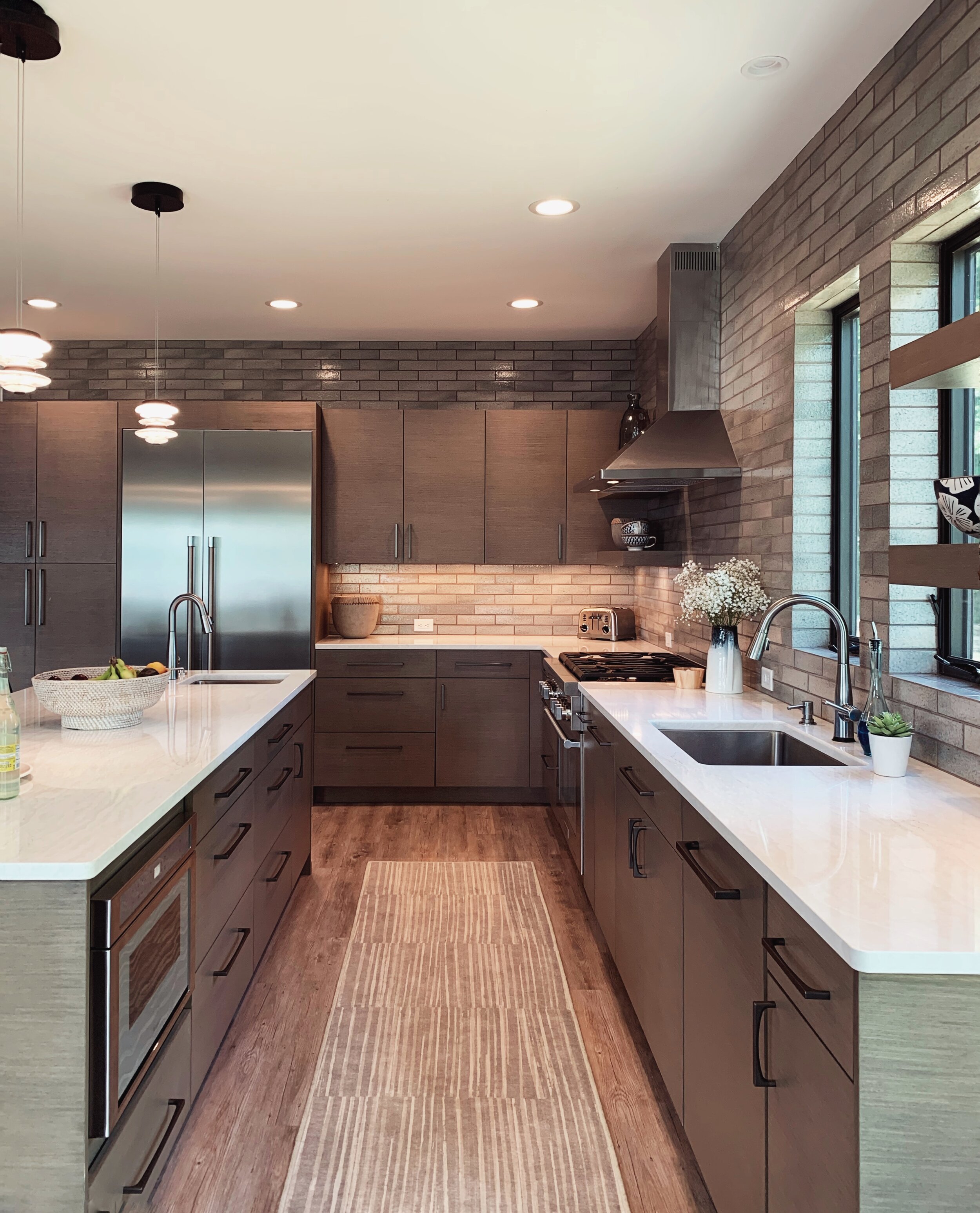  kitchen design, custom cabinets, kitchen countertops, kitchen lighting, black windows, neutral paint,  