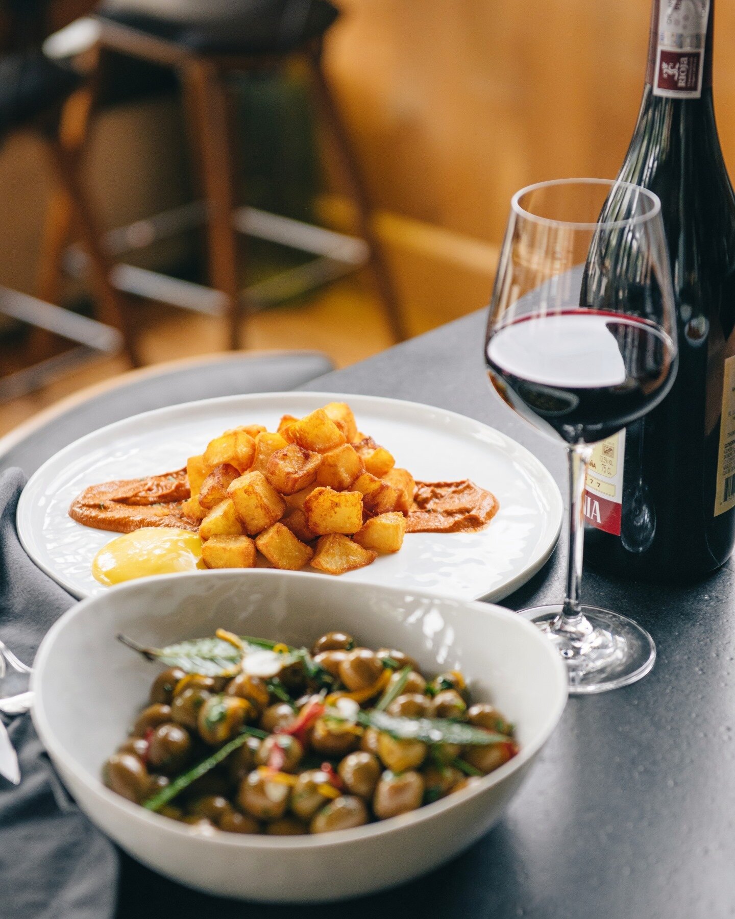 We're kicking off our first full week with two of our house favorites: Olivos Laurel &amp; our Patatas Bravas. 

We're open Tuesday-Friday from 4pm-10pm &amp; Saturday from 12pm-10pm. View our fully menu via the link in our bio! #laurelonrutledge