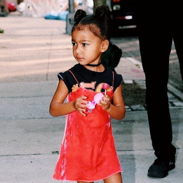 Today, Miss North West, the original queen of the t-shirt and slip dress combo, turns 8 🌸 In her first few years of life, North has already appeared in American Vogue, performed an original song at Paris Fashion Week, and walked the @lolsurprise run
