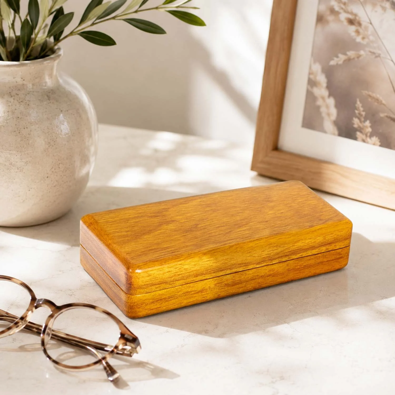 osage-orange-eyeglass-case-closed-stone-surface-lifestyle.jpg
