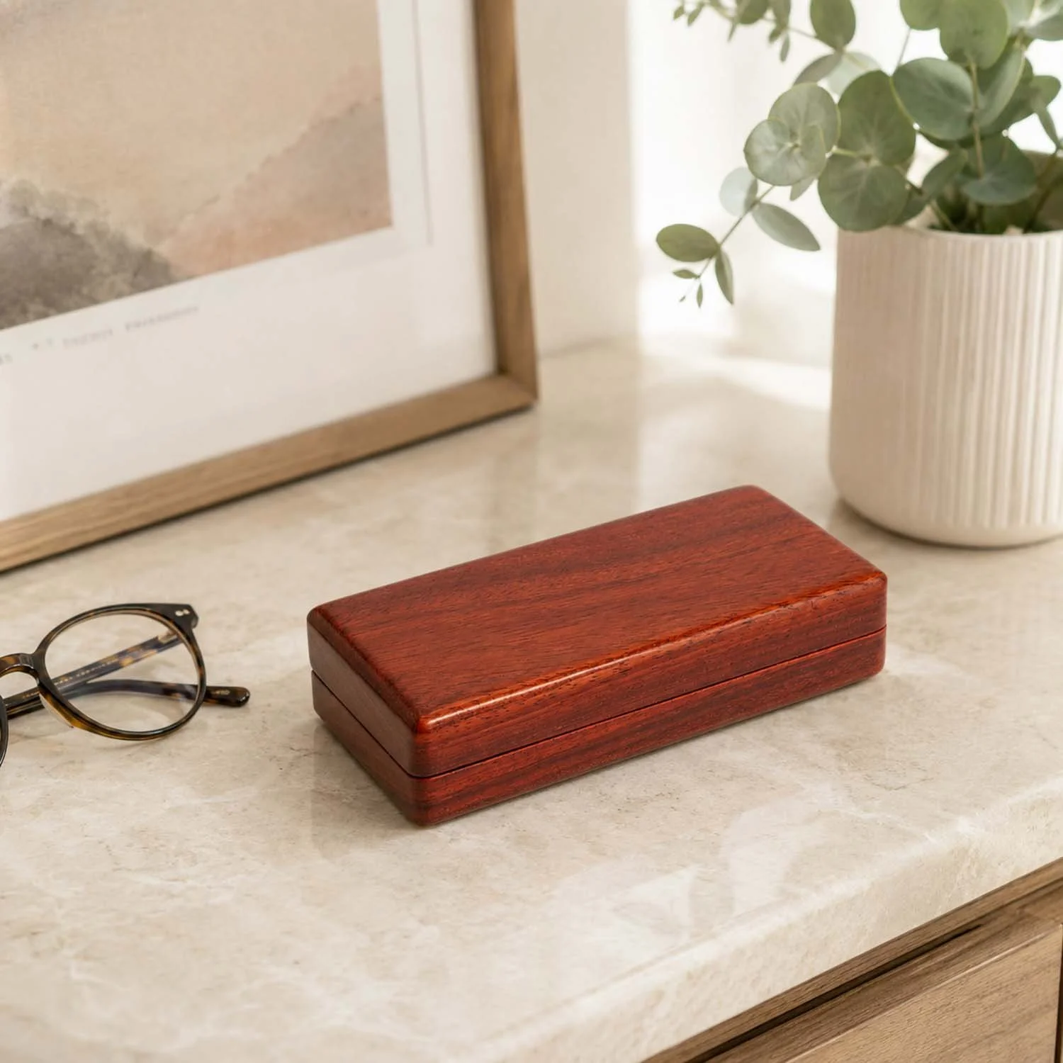 closed-padauk-eyeglass-case-marble-console.jpg