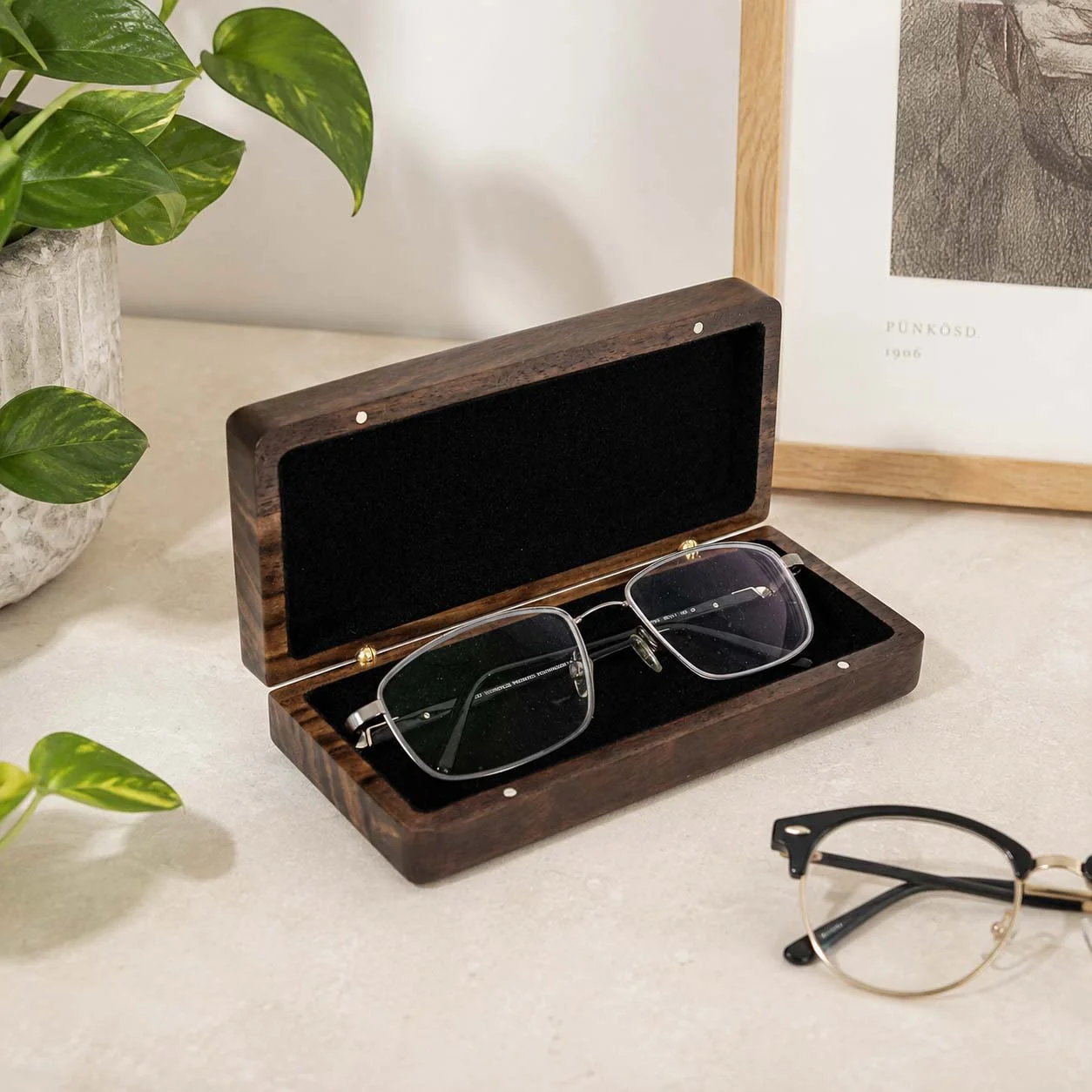 walnut-eyeglass-case-open-counter-with-glasses.jpg