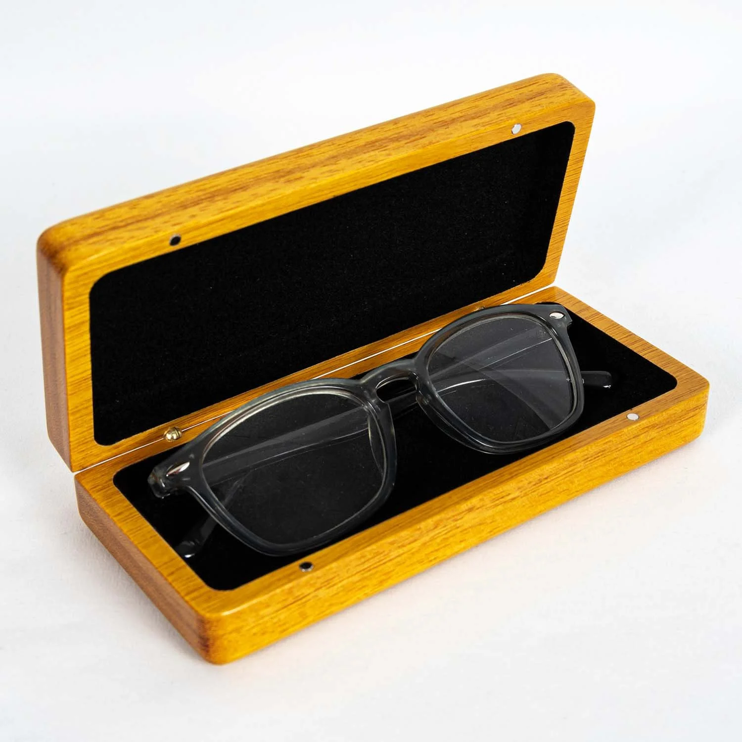 open-osage-orange-eyeglass-case-dark-frames-studio.jpg