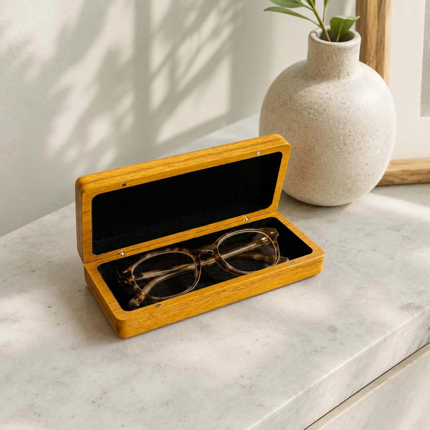open-osage-orange-eyeglass-case-with-glasses-lifestyle.jpg