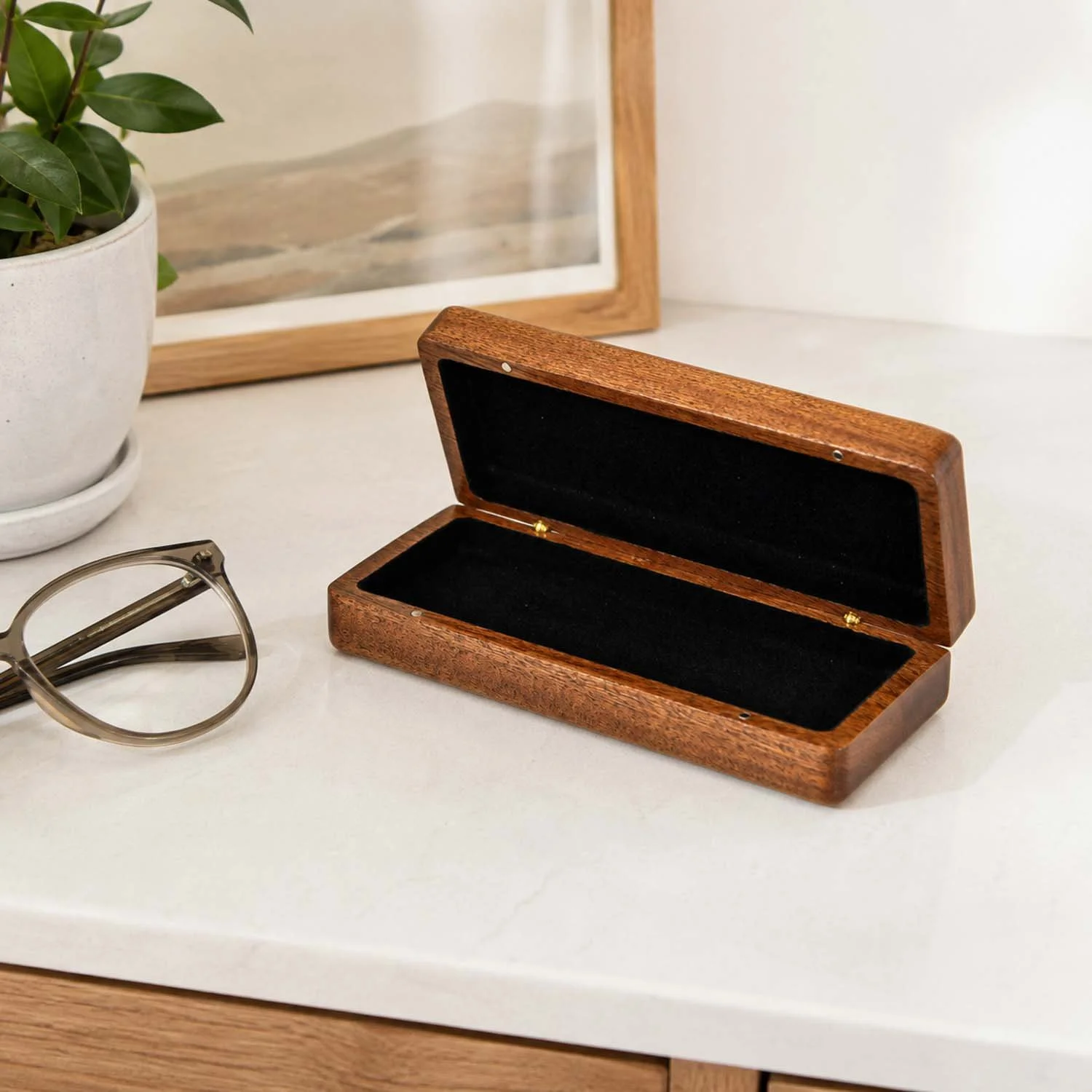 sapele-eyeglass-case-lifestyle-stone-surface-open-empty.jpg