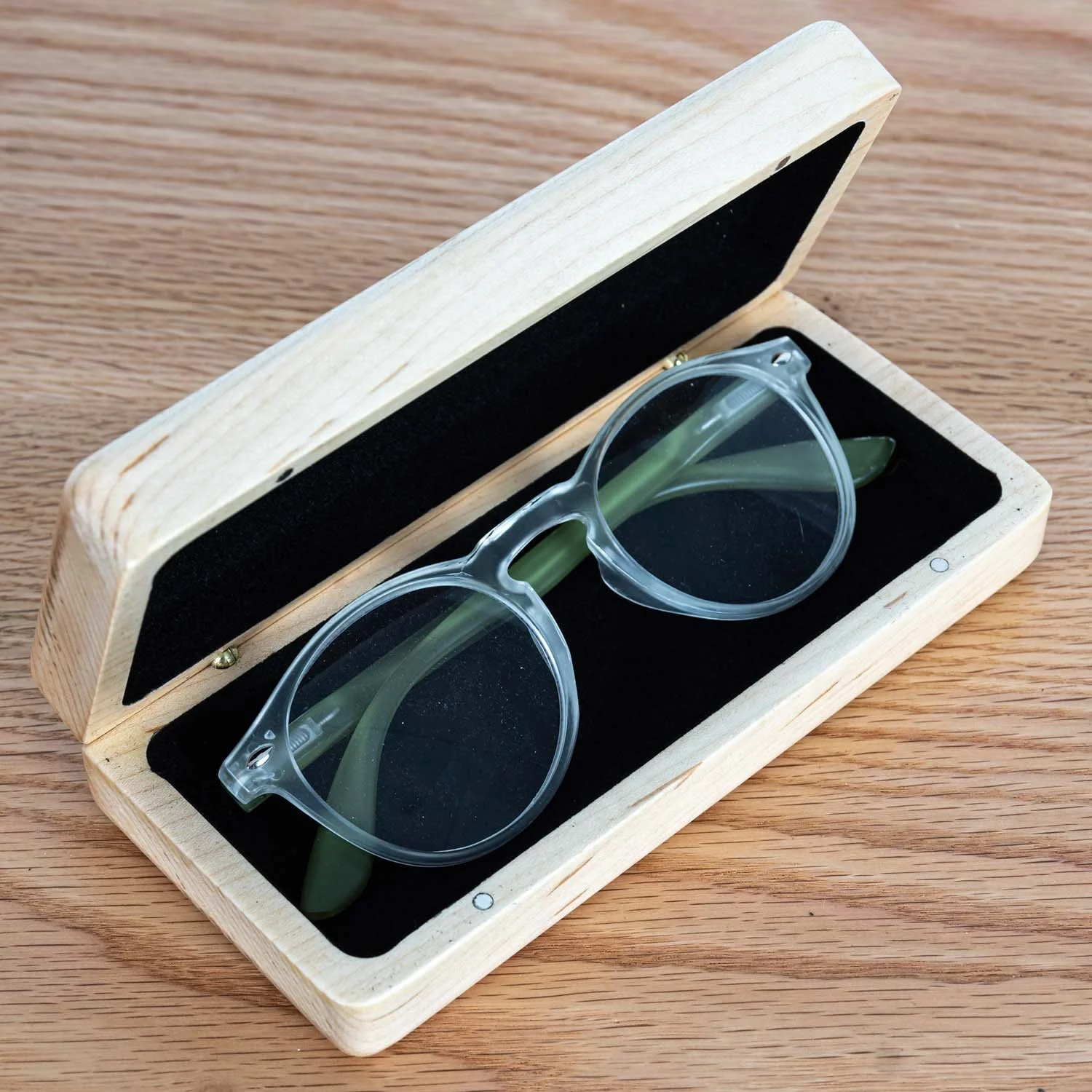 maple-eyeglass-case-with-glasses-wood-surface-tweatherheadco.jpg
