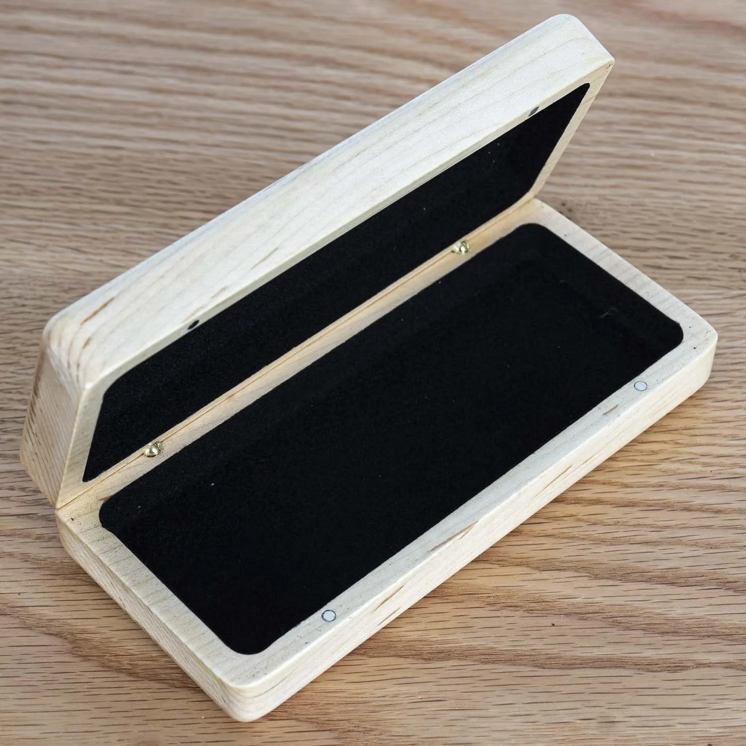 maple-eyeglass-case-open-wood-surface-tweatherheadco.jpg