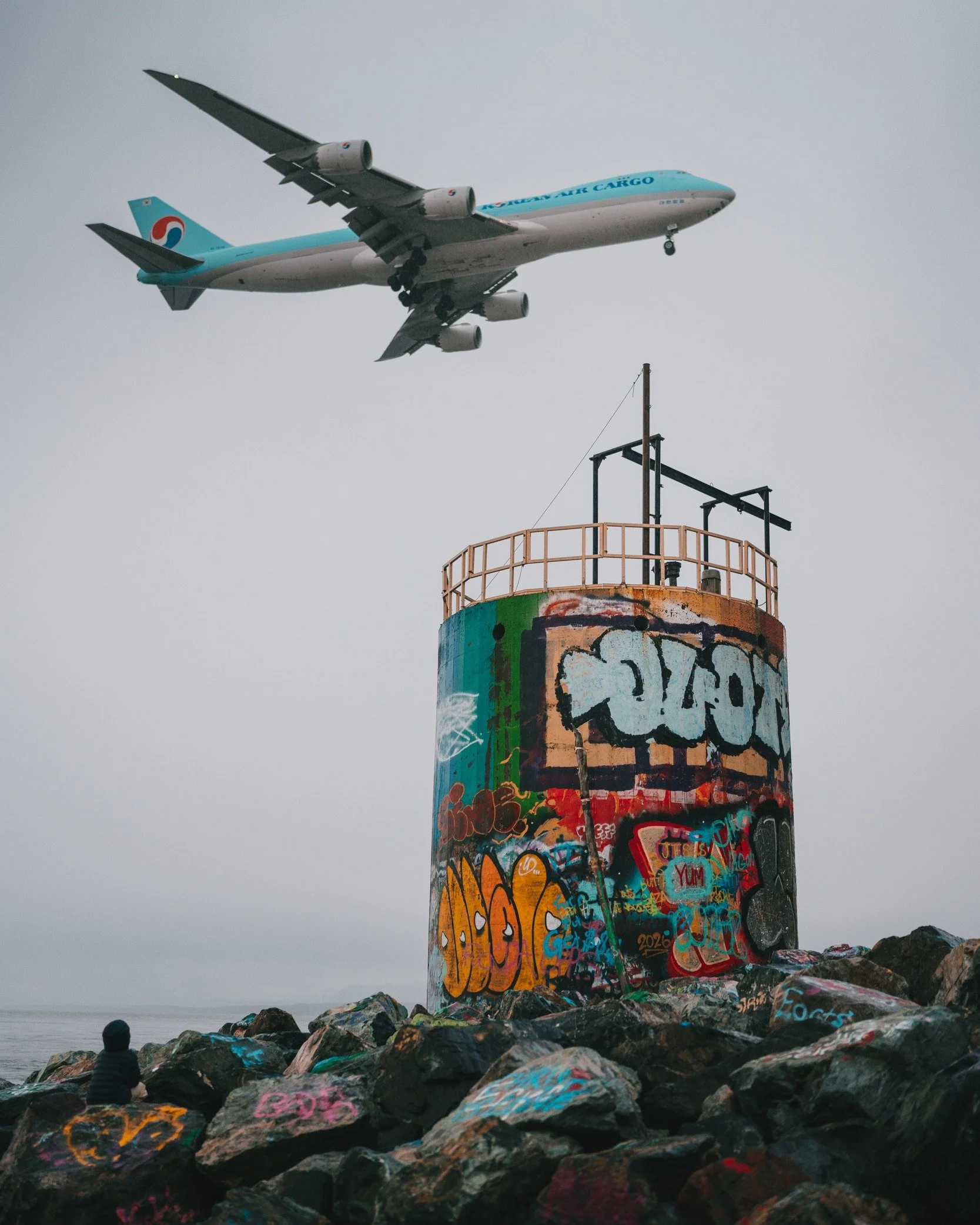 Farewell, Alaska. It was a gloomy day with nonstop rain. My son saw airplanes. I saw colors, layers, and one last reason to keep photographing.

Sometimes the weather might change the photo you planned, but it might also give you new opportunities to