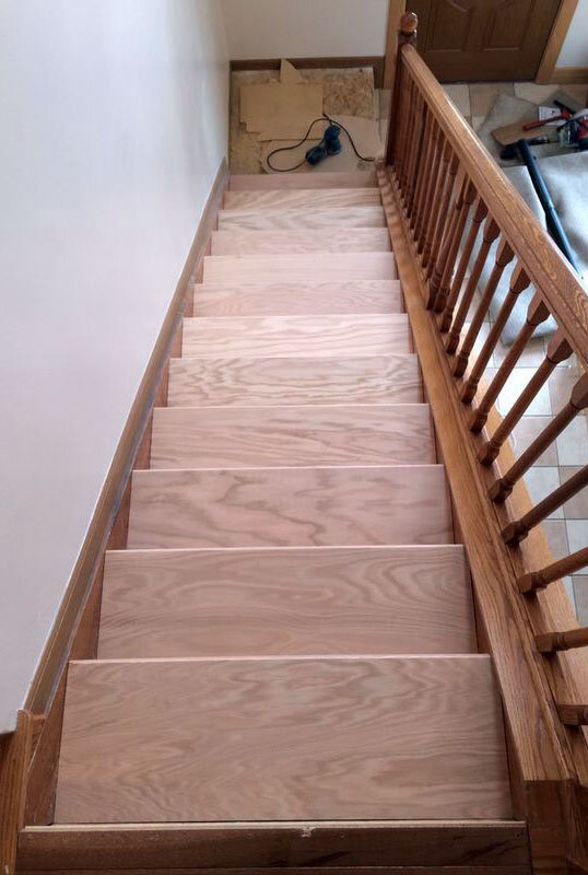 stairs with new treads installed and nailed down